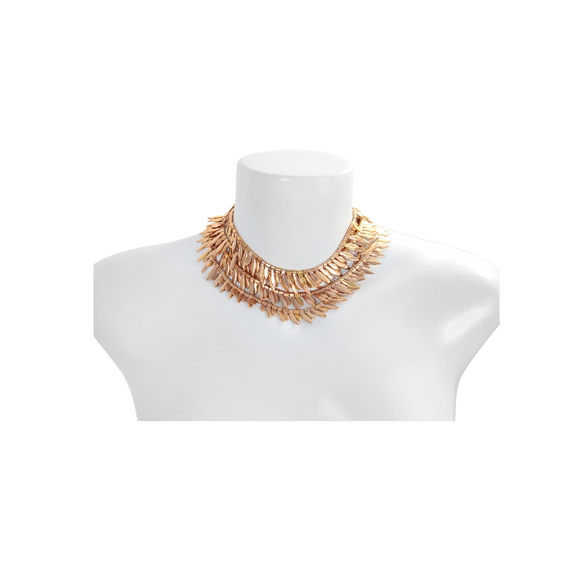 Vintage Anne Klein Arrow/Feather-Like Gold-Tone Long Necklace. As shown in my photos, this necklace can be worn doubled, tripled, or doubled with the necklace against your neck. This is a very long necklace, allowing you to wrap it in many different