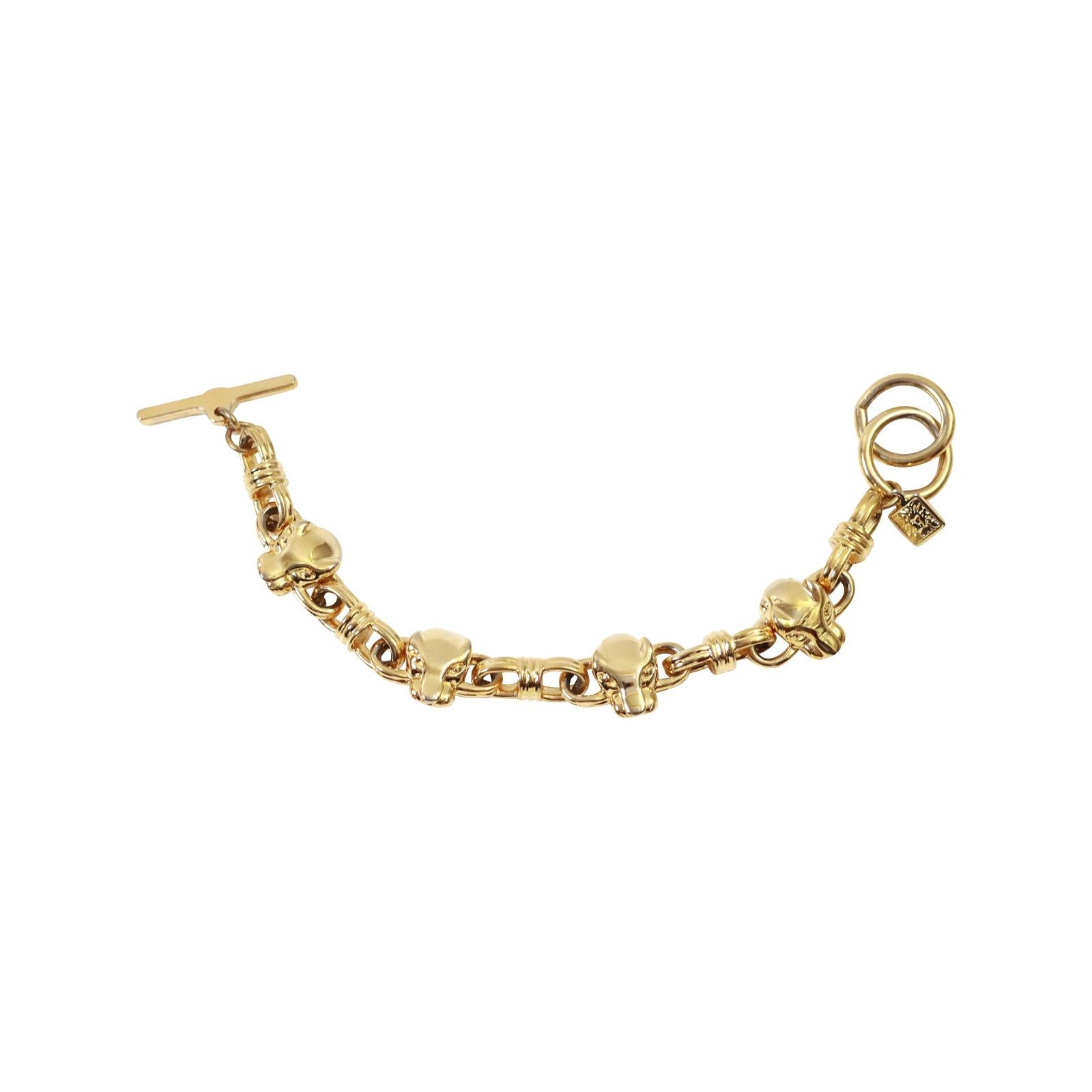 Vintage Anne Klein Gold tone Panther Toggle Bracelet Circa 1990s.  These are like secrets from the 1980s/1990s.  They are well made and were made during the period that are so chic.  Anne Klein jewelry was so well made and so sought after during the