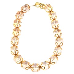 Collar de lazo vintage Anne Klein de lucita y bolas rellenas de oro
