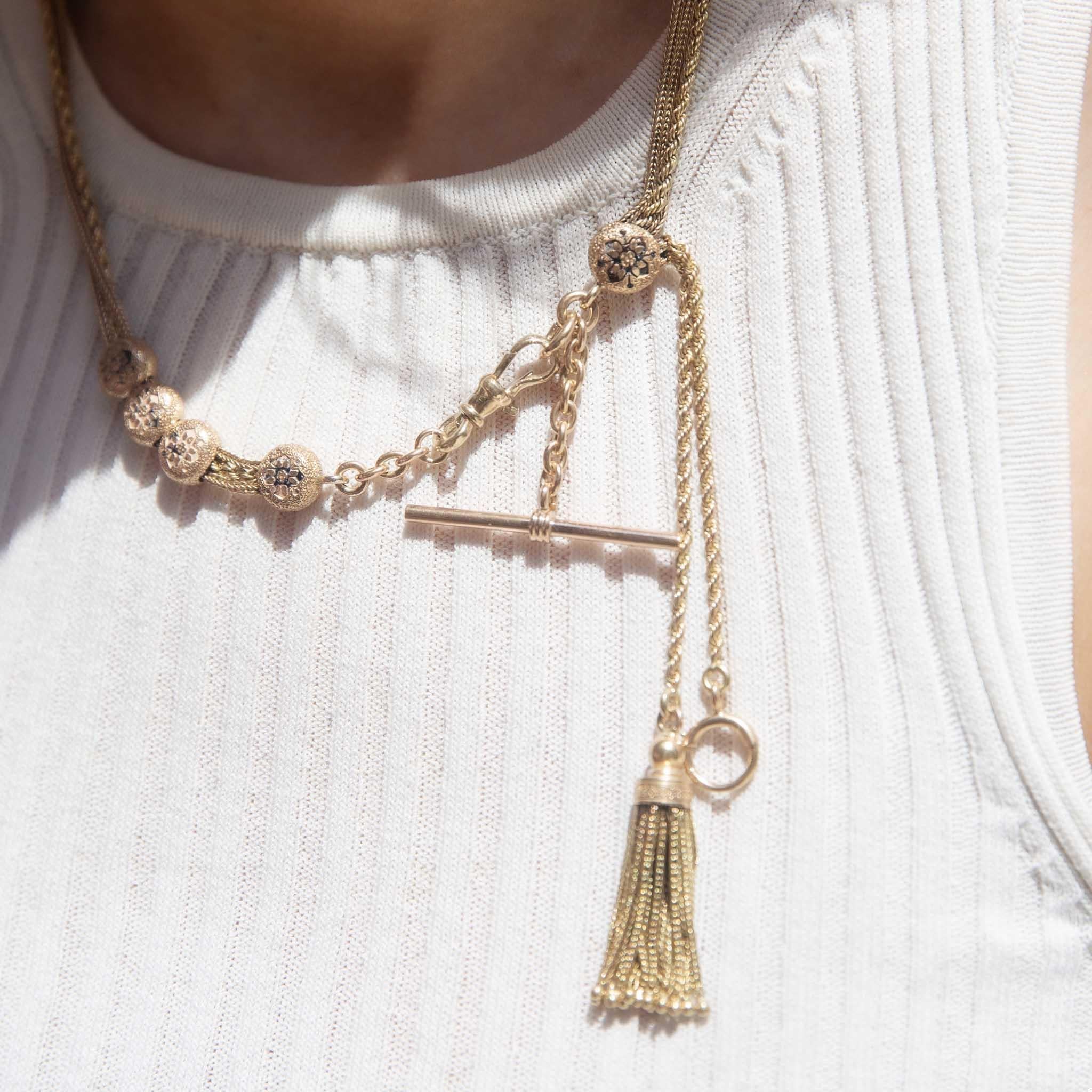 Lavishly crafted in 18, 15 & 9 carat gold, The Suelaidy Necklace is a bohemian delight. Her multi strand chains, tassel and tog offer up layer upon layer of curiousness. She is meant for one who is willing to lean in to their