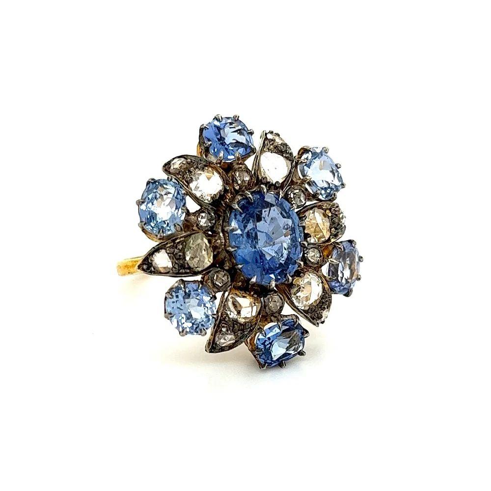 Simply Beautiful! Finely detailed Antique Cluster Sapphire and Diamond Cocktail Ring. Centering a securely nestled Hand set 2.80 Carat NO HEAT Sapphire GIA, surrounded by Diamonds, approx. 0.90tcw and Sapphires, approx. 3tcw. Ring size 6.75, we