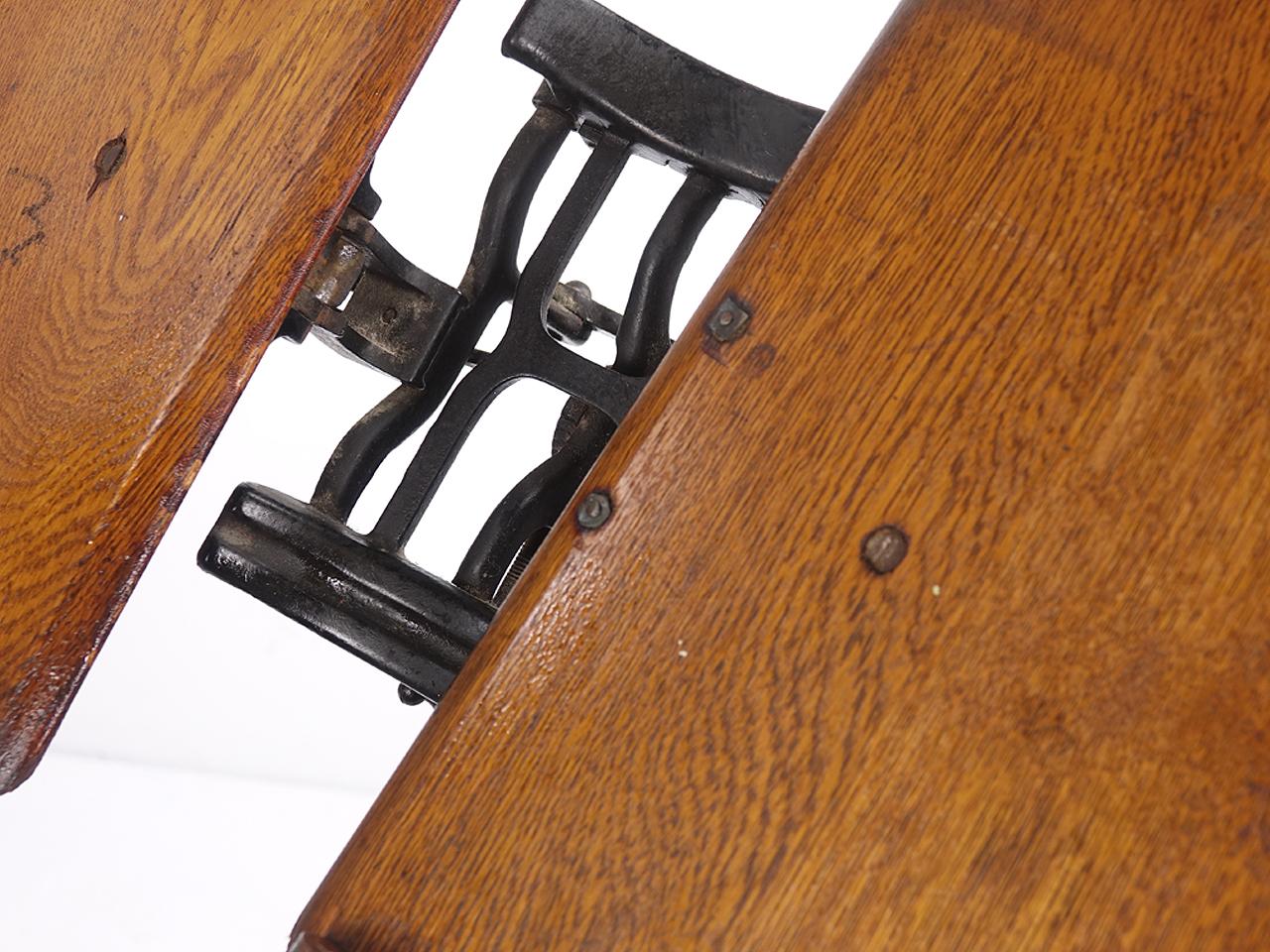 Vintage antique ornate oak and cast iron adjustable bible, dictionary, book stand, table. Early 1900s. The top supports can be adjusted to various angles, and they can be snapped closed to securely hold a book, etc. Note the ornate cast iron book