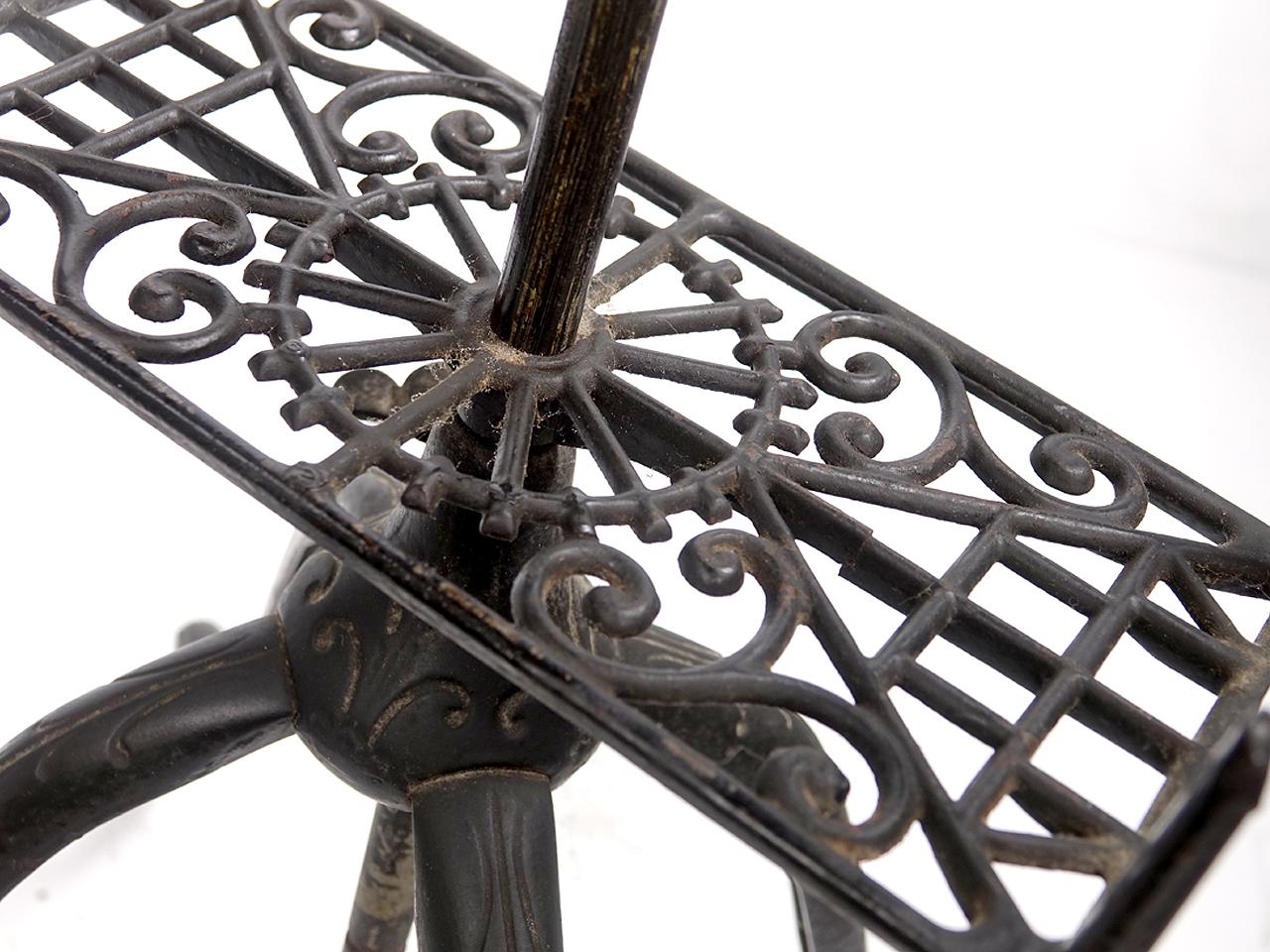 antique cast iron book stand