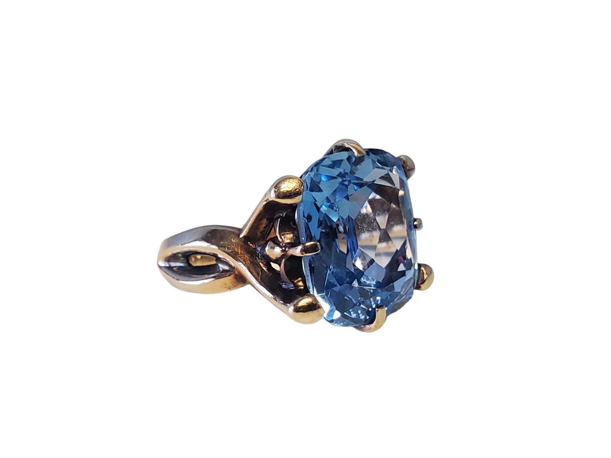 Vintage 10k Yellow Gold Ring with Antique Cushion Blue Gem Center

Listed is a vintage blue cushion gemstone. The center stone is likely synthetic but still beautiful oceany blue color. The ring is in good condition for its age and the stone has