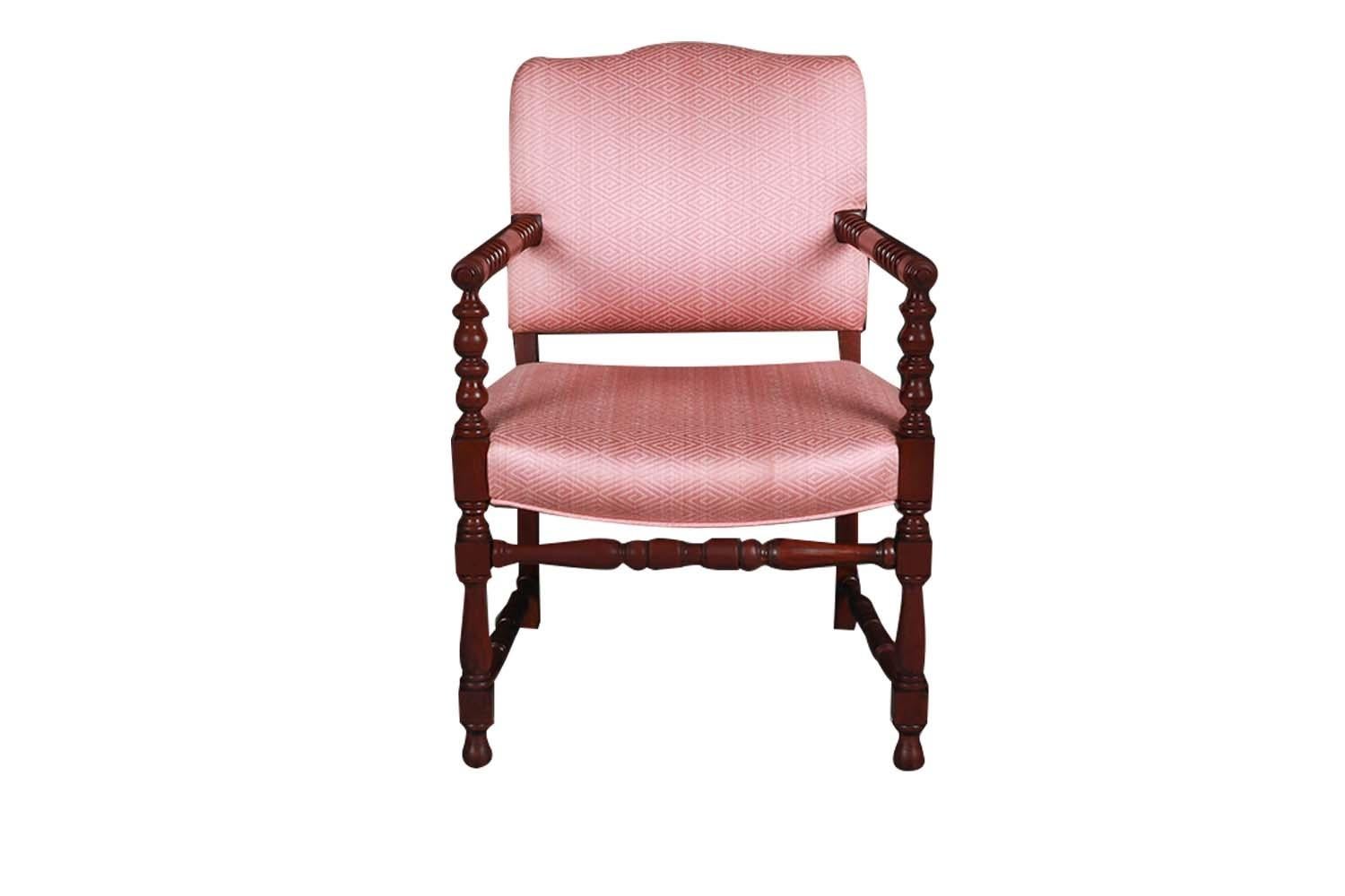 An attractive Walnut Bobbin Turned Armchair with Blush Upholstery. Early 20th Century English style block and bobbin turned spindle walnut armchair. Features original dusty rose pink upholstery in light mauve fabric has a subtle diamond weave.