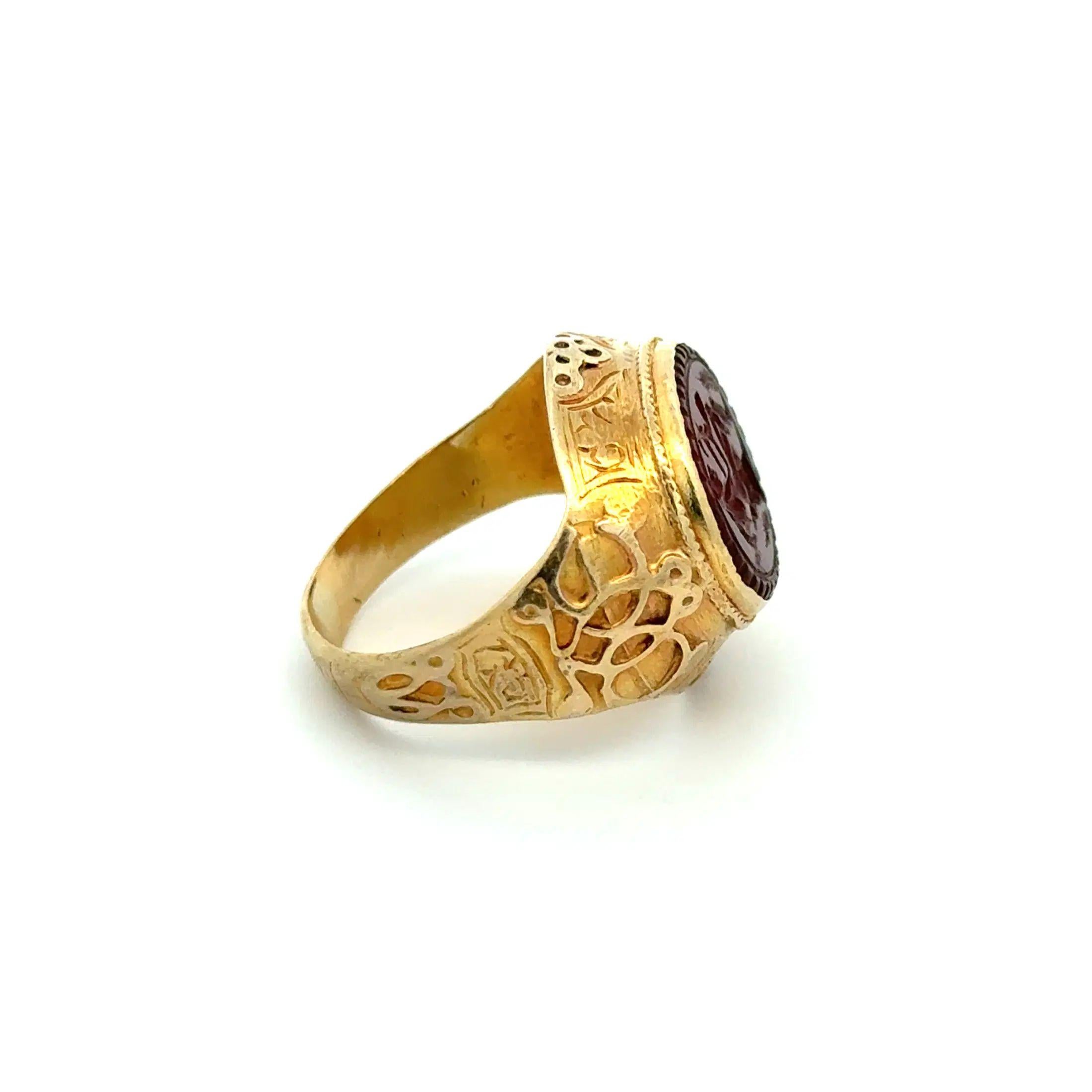 Simply Beautiful! Vintage Antique Hand carved Carnelian Intaglio Unisex Signet Ring. Set in a Hand crafted 15K Yellow Gold mounting. Approx. dimensions: 0.9” w x 0.9” h x 0.7” d. The Intaglio has a closed back. Ring size 7, we offer ring resizing.