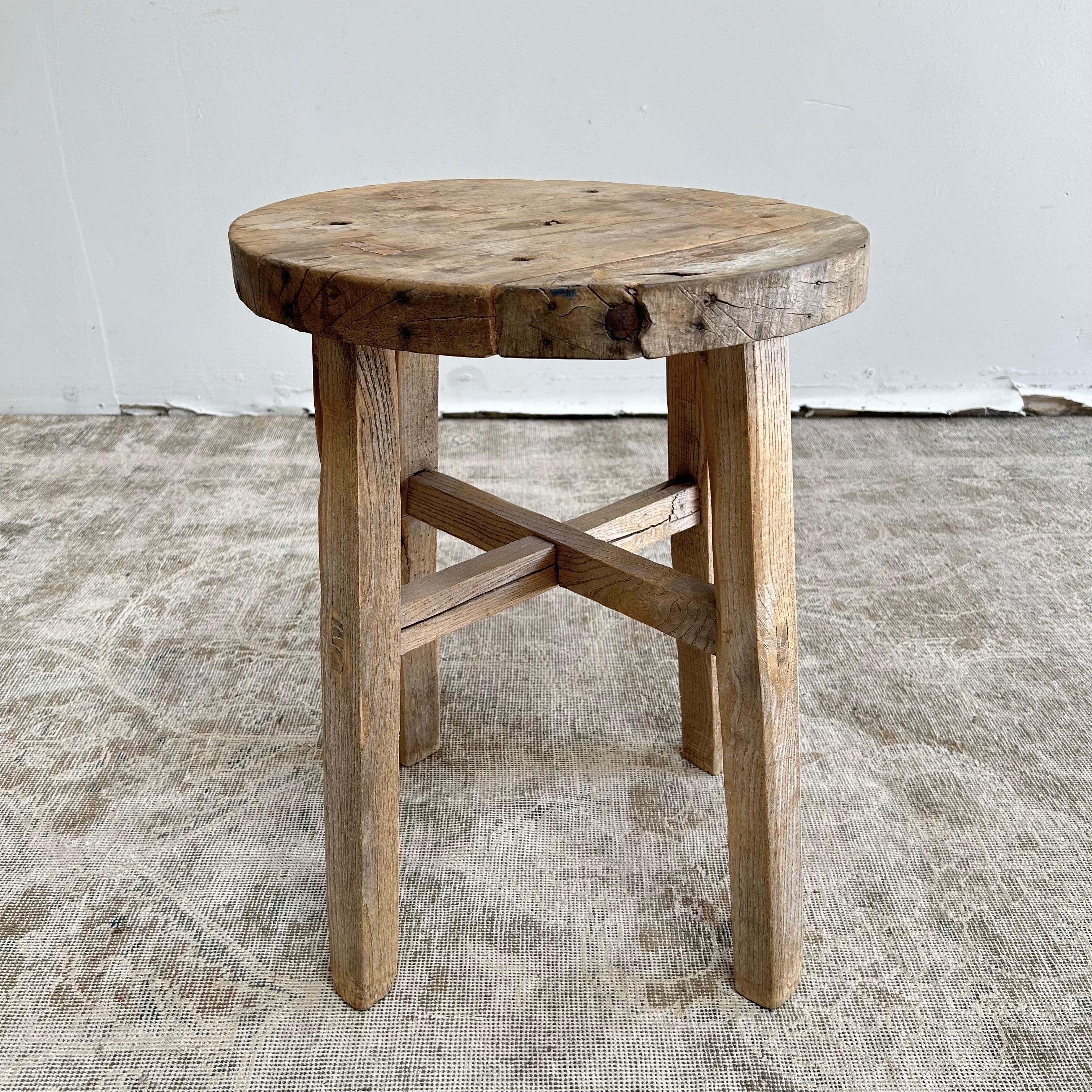 This vintage elm wood table is finished with medium stain. The table is solid and sturdy ready for everyday use. Use as a side table, stool, powder room to add vintage style to your home. One of a kind item.
Round elm table 18”rd. X 24”h.