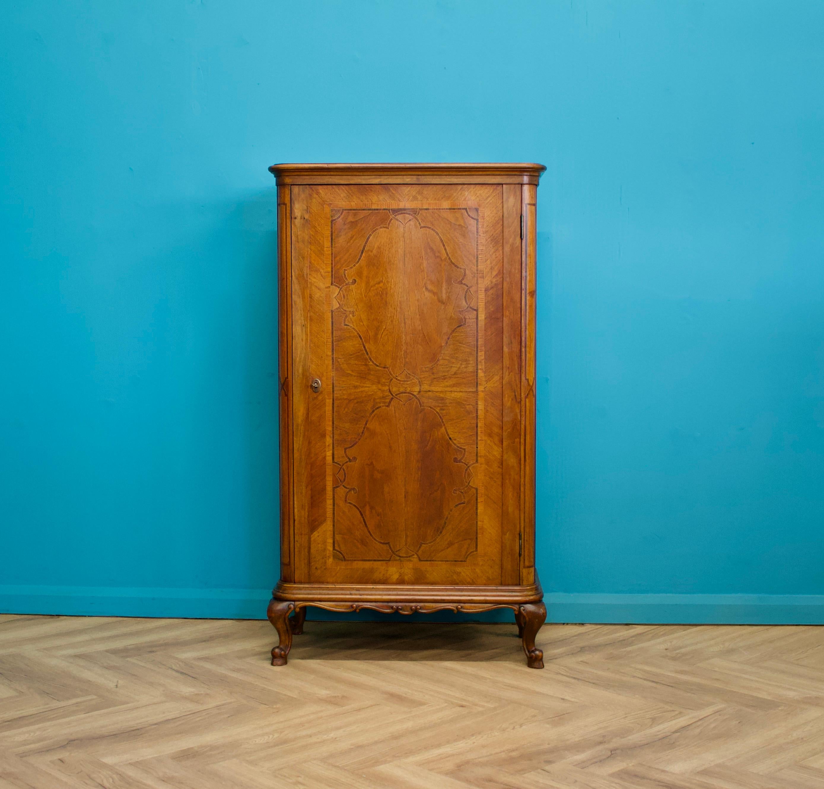 An impressive quality French burr walnut inlaid compact wardrobe
Featuring a rail and a shelf
The rail can be removed and shelves added, to use this piece as a storage / linen cupboard or cabinet
Standing on hoof feet