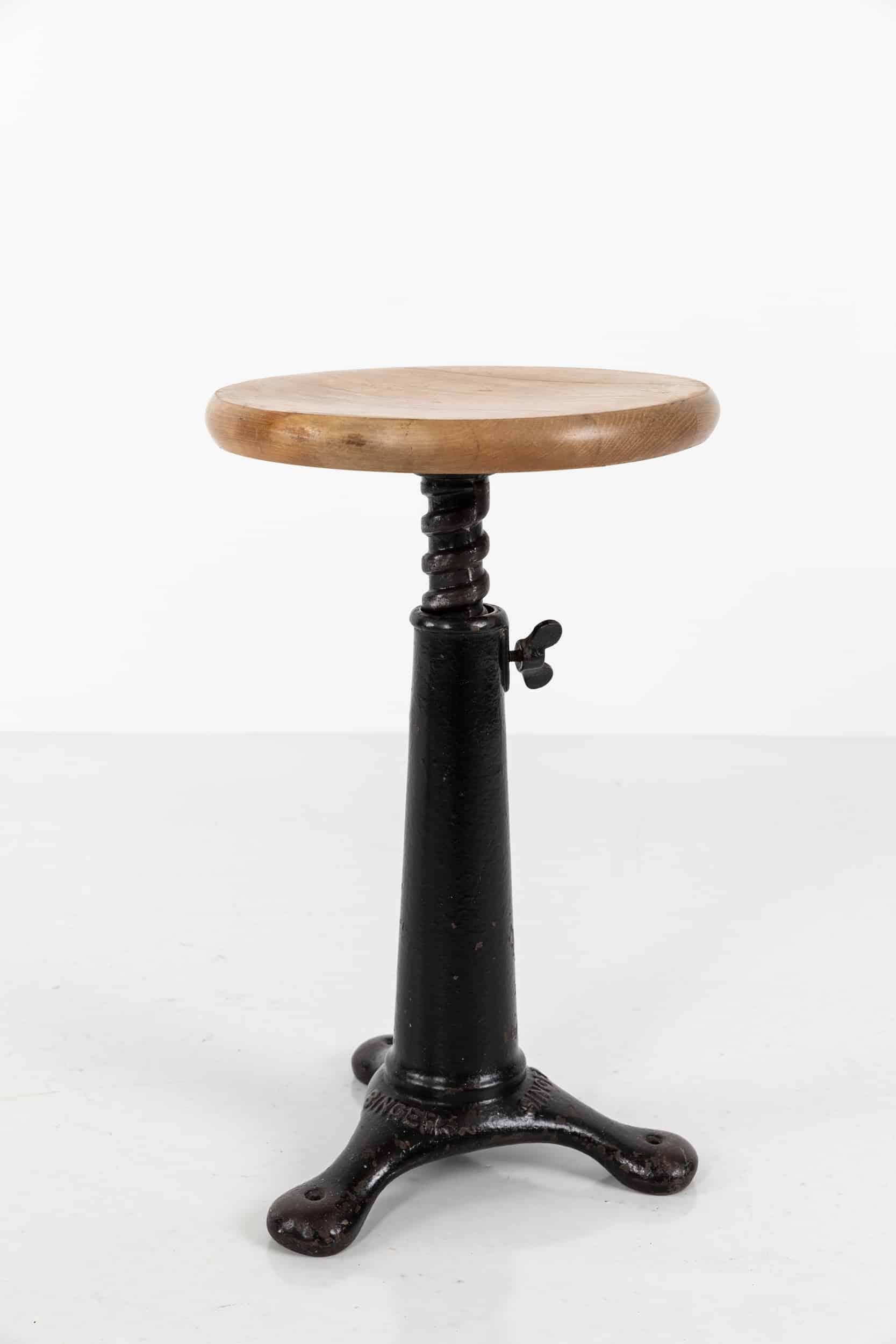 Original example of the iconic 3-legged Singer sewing stool. c.1930

Originally, these stools lined factory floors, and were adapted over time to make them more comfortable for workers. In original condition with hardwood seat top. Height