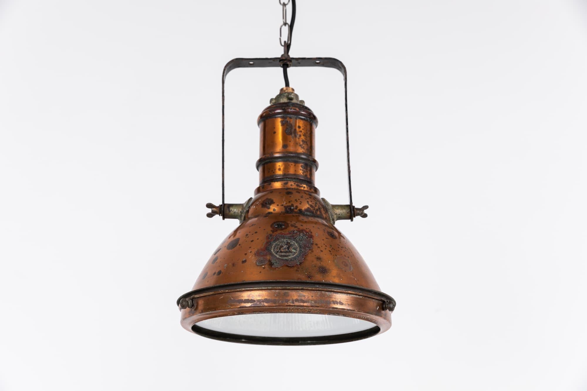 Stunning copper pendant lamp made in England by renowned light manufactures GEC - General Electric Company. c.1930

Spun copper shade in original condition with unusual and attactive and patina. Debossed brass makers badge still in place along with