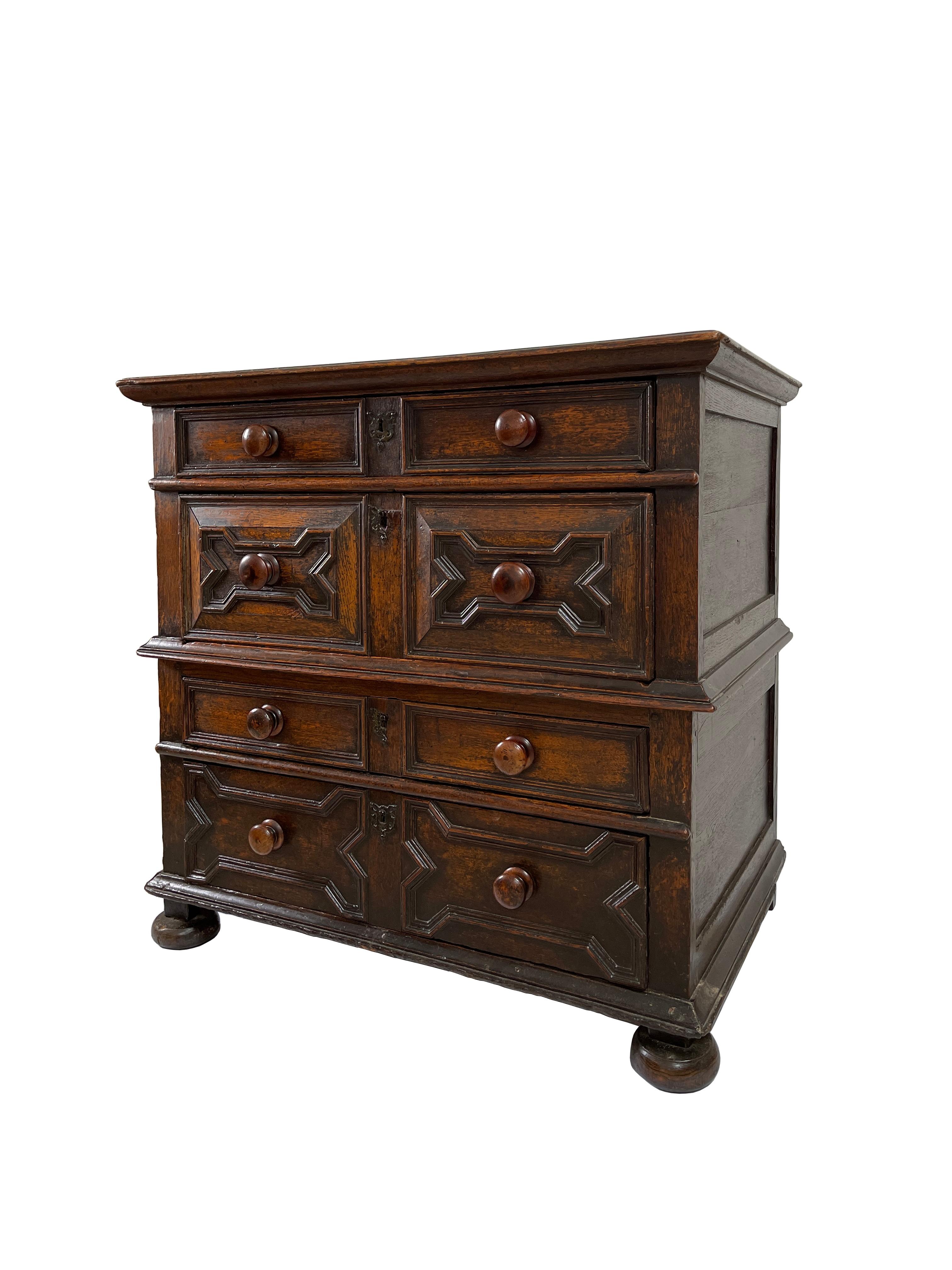- A wonderful oak geometric chest of drawers from the Georgian era.
- The oak is in an incredible condition for its age with a well figured wild grain and rich patina.
- There are four drawers in total each with exquisite geometric design and