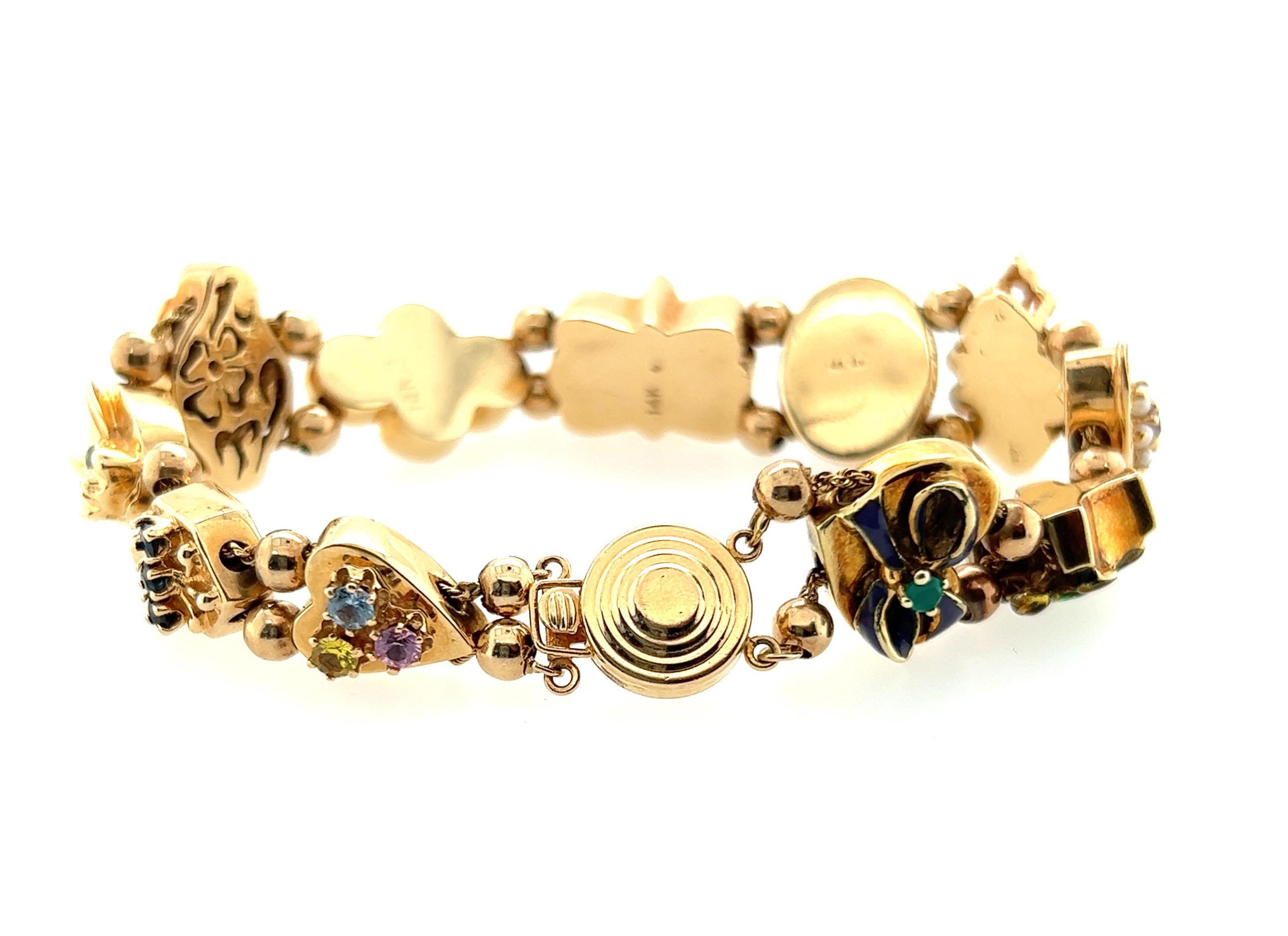 Antikes Original Slide Charm-Armband aus 14 Karat Gelbgold mit Edelsteinen, Vintage, 1949 (Ovalschliff)