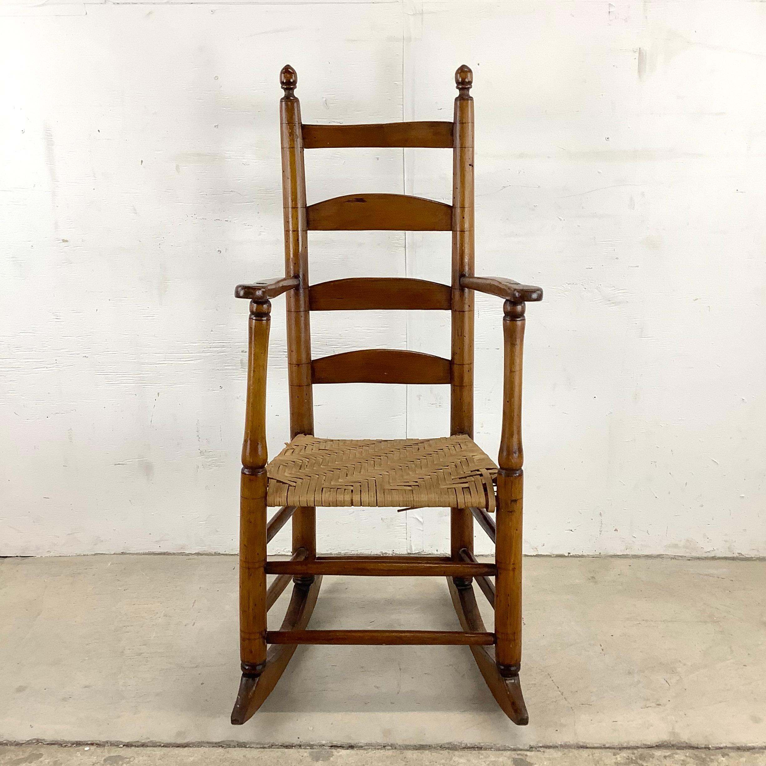 This antique rush seat child rocking chair is a charming piece that combines nostalgic style and timeless functionality. This exquisite rocking chair is the perfect addition to your child's room or any space that needs a touch of vintage