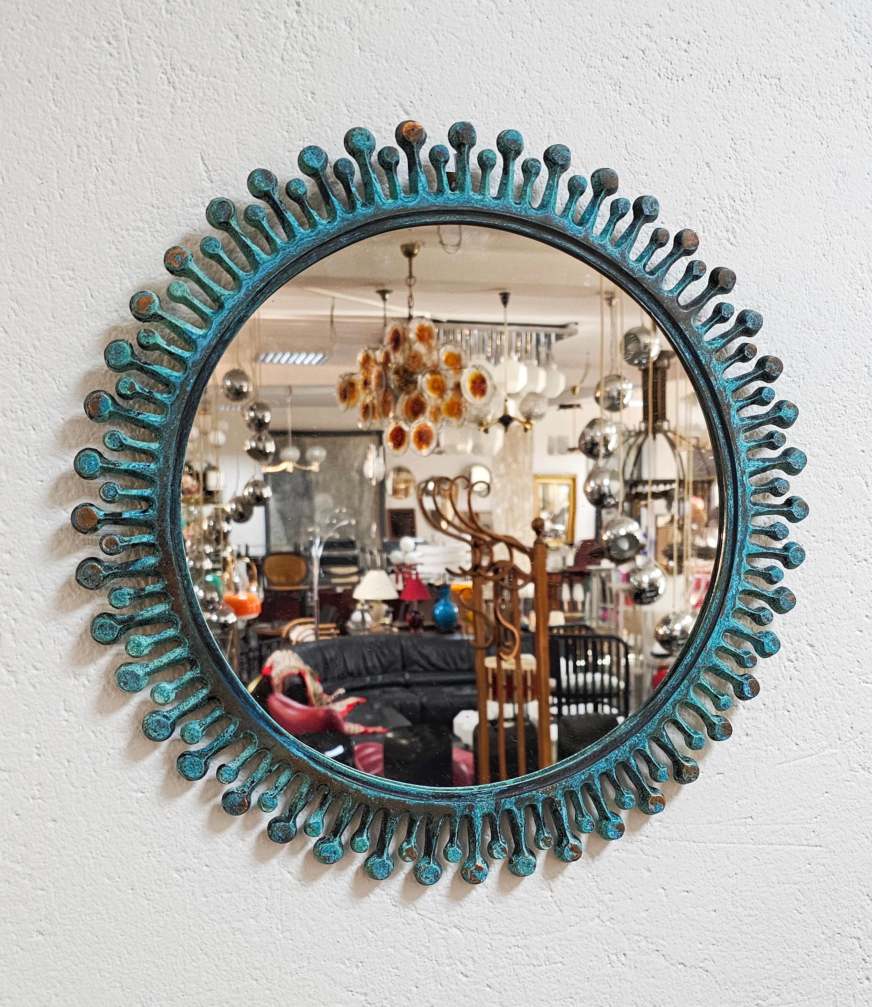 Mid-20th Century Vintage/Antique Sunburst Mirror made of Bronze with heavy green/blue patina For Sale