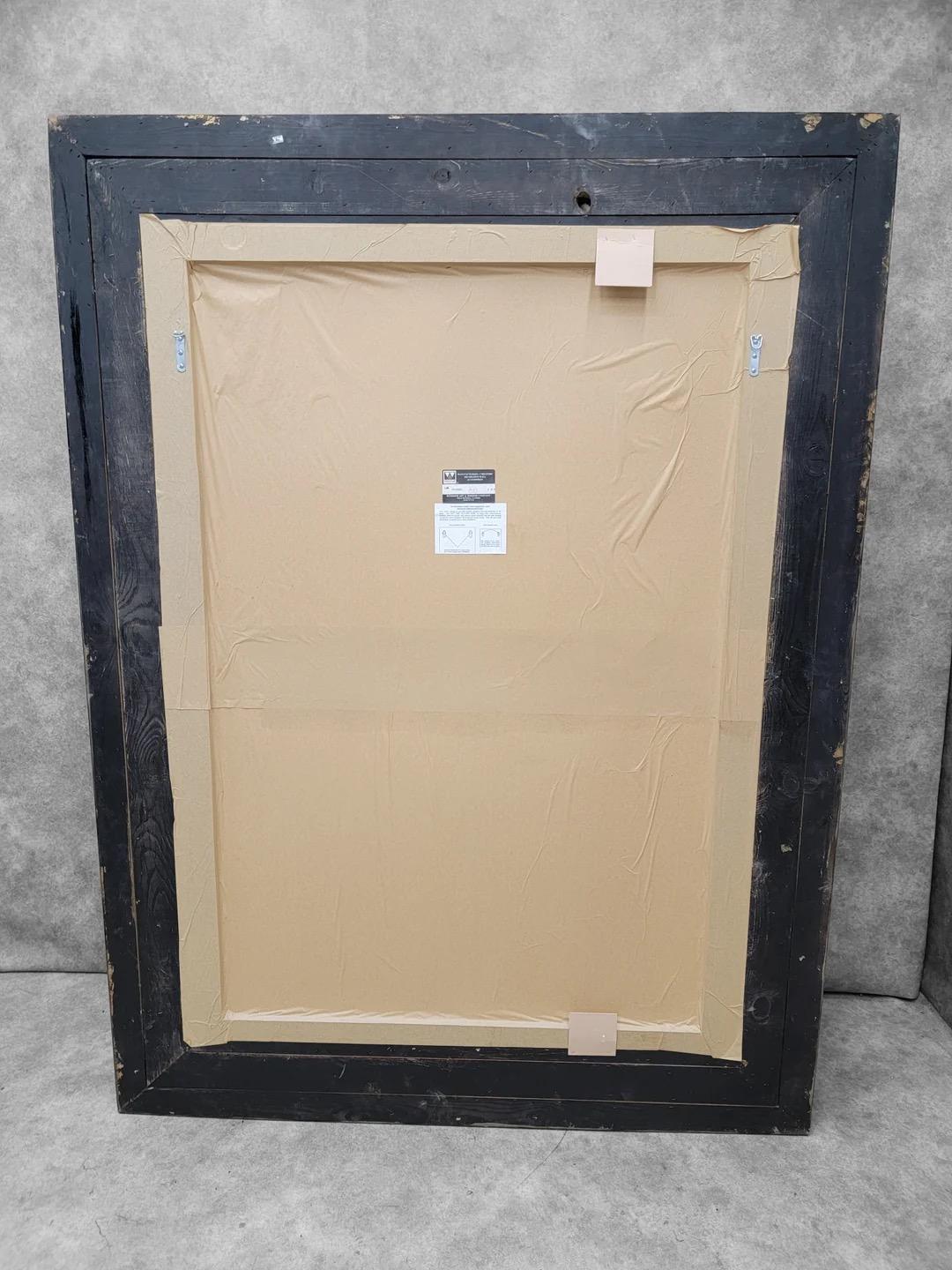 Miroir mural biseauté à encadrement en bois doré, de style Antiquities Bon état - En vente à Chicago, IL