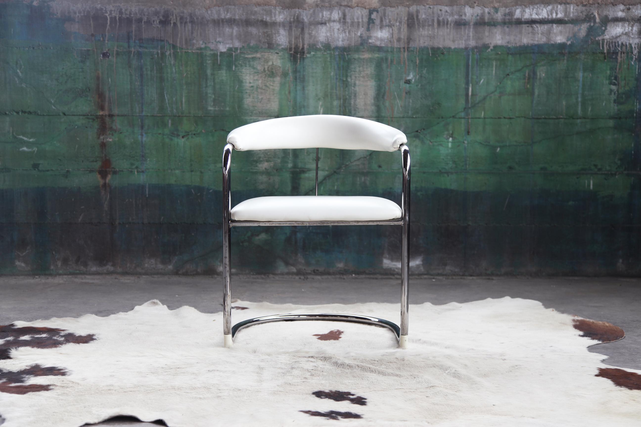 Stunning Anton Lorenz for Thonet Cantilevered Armchair in white.  
This is the Perfect opportunity to purchase just one as an accent chair!

Anton Lorenz (1891–1966) was a design pioneer and frequent collaborator of Marcel Breuer. He, along with