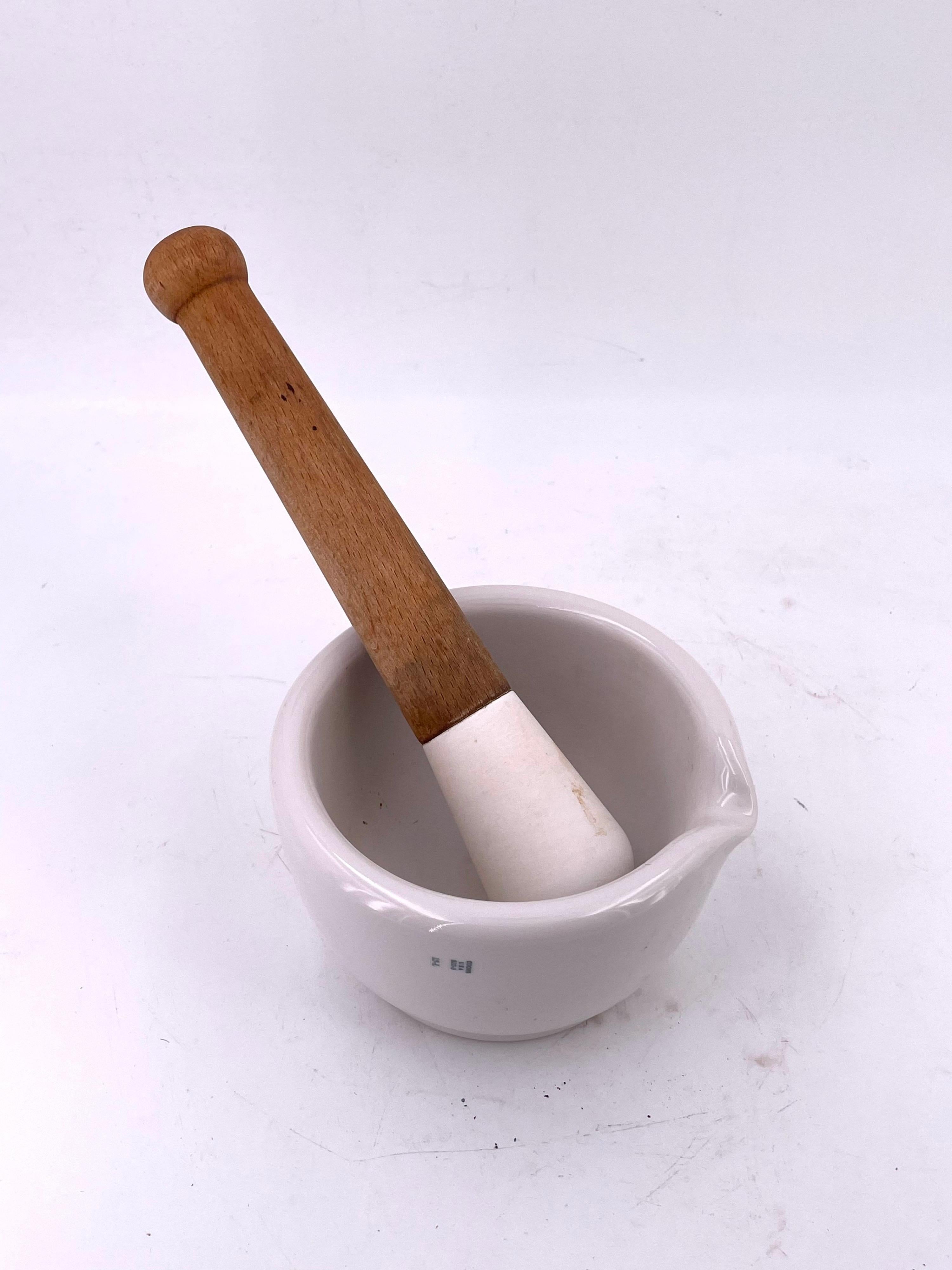Porcelain mortar and pestle. Great for cooks or as an accent piece. Heavy duty. By Coors USA.