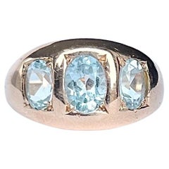 Retro Aquamarine and 9 Carat Rose Gold Three Stone Ring