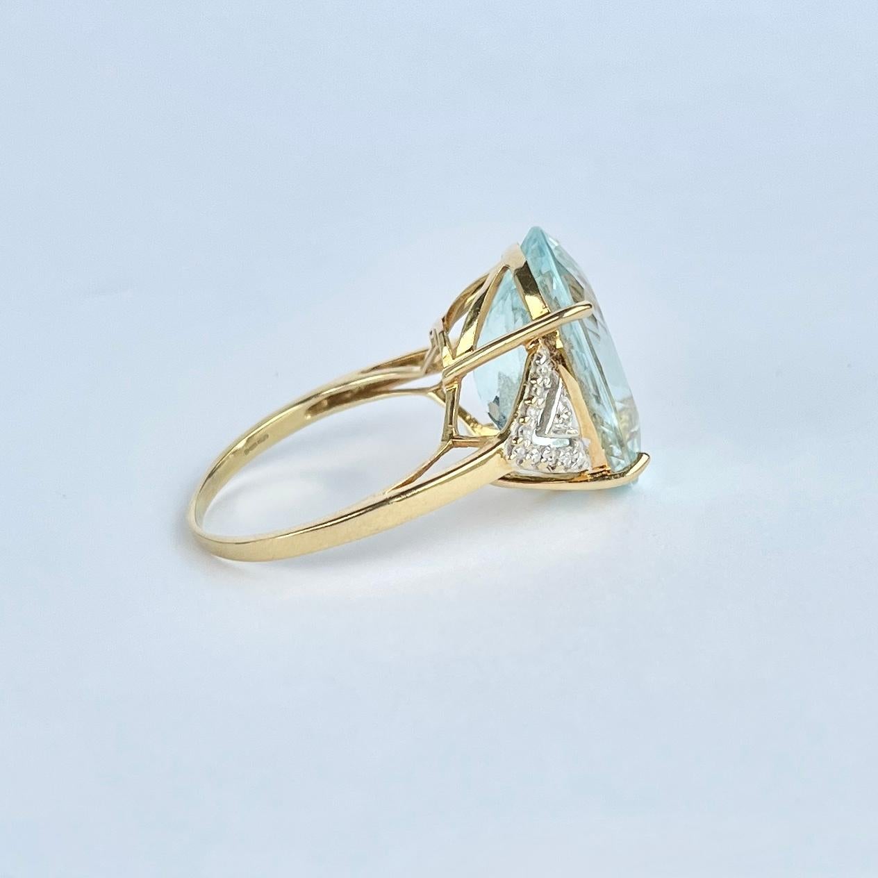 Sitting proud at the centre of this wonderful ring is a sparkling aqua stone. The aqua stone measures approx 11ct and is so sparkly. The shoulders hold 10pts of diamond each. The diamonds are set in platinum but the ring is modelled in 18carat gold.