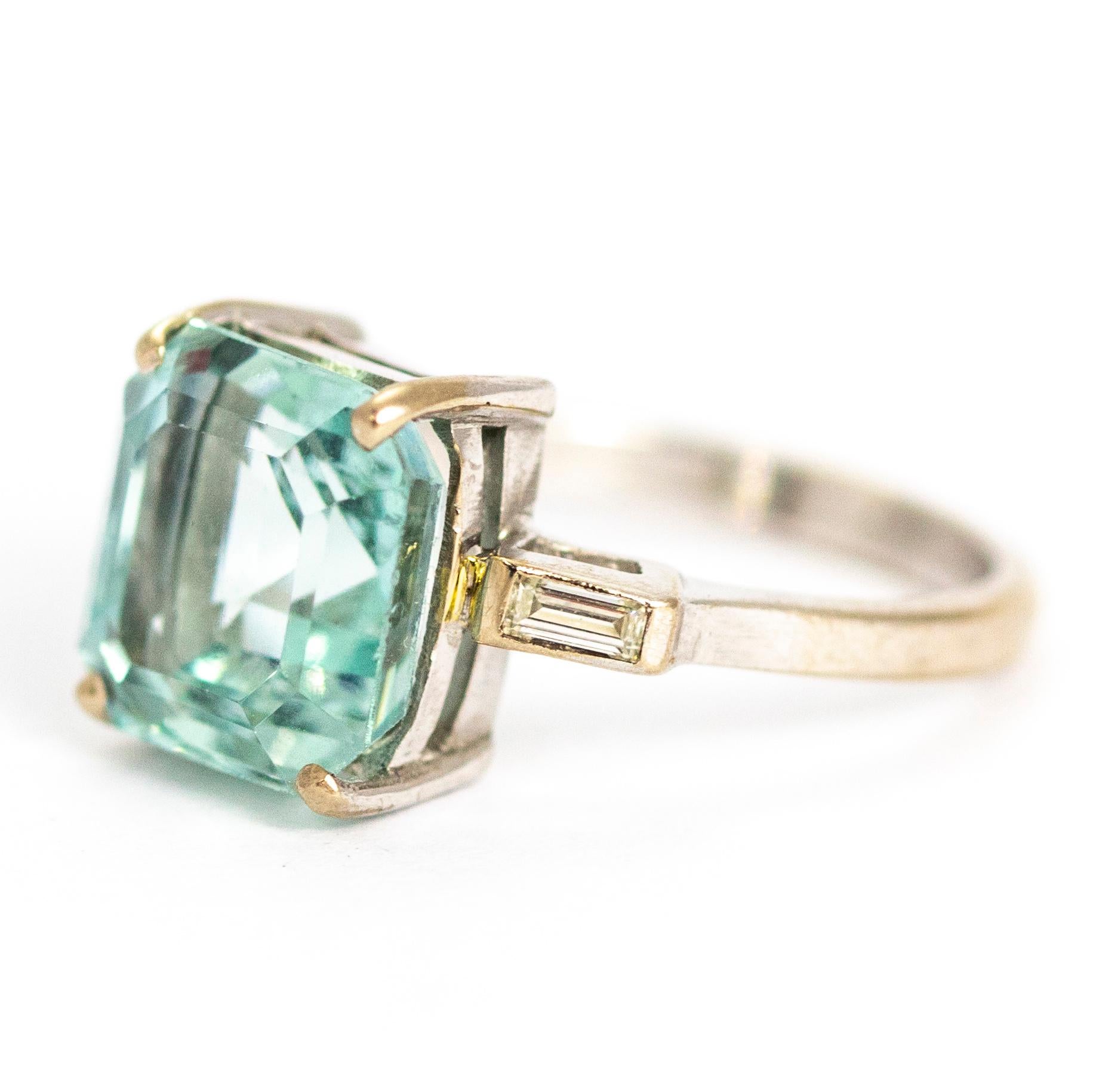 The half mirrors effect on this aqua is stunning! The octagonal cut Aqua stone is a beautiful place blue and reflects the light wonderfully. The shoulders feature baguette diamonds and the ring itself is modelled out of 18ct white gold. Made in