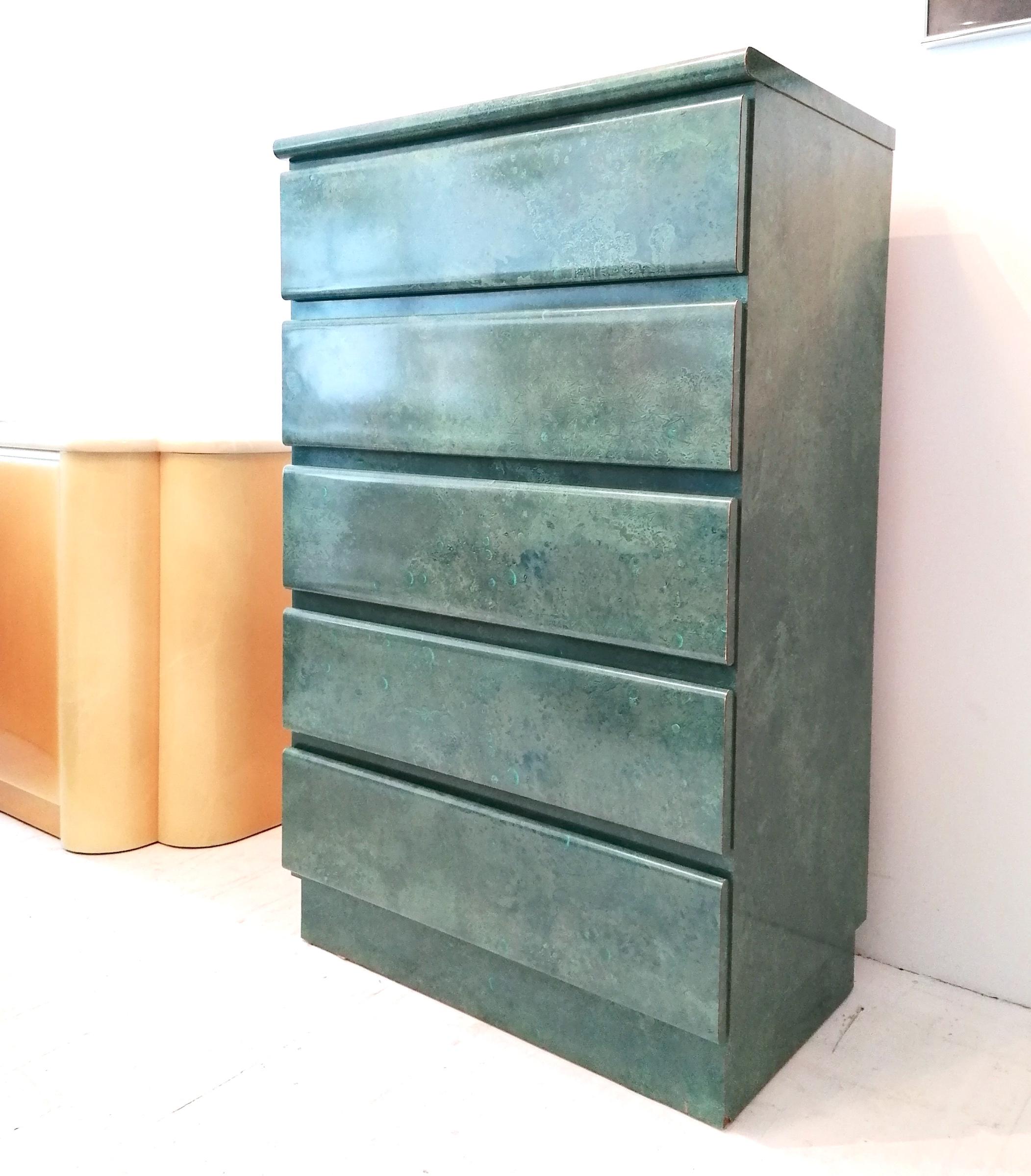 A stunning postmodern 1980s lacquer laminate tall drawer cabinet with 5 large drawers, in a beautiful tonal aqua/jade/green finish. All drawers run smoothly. Sourced in Miami, Florida.