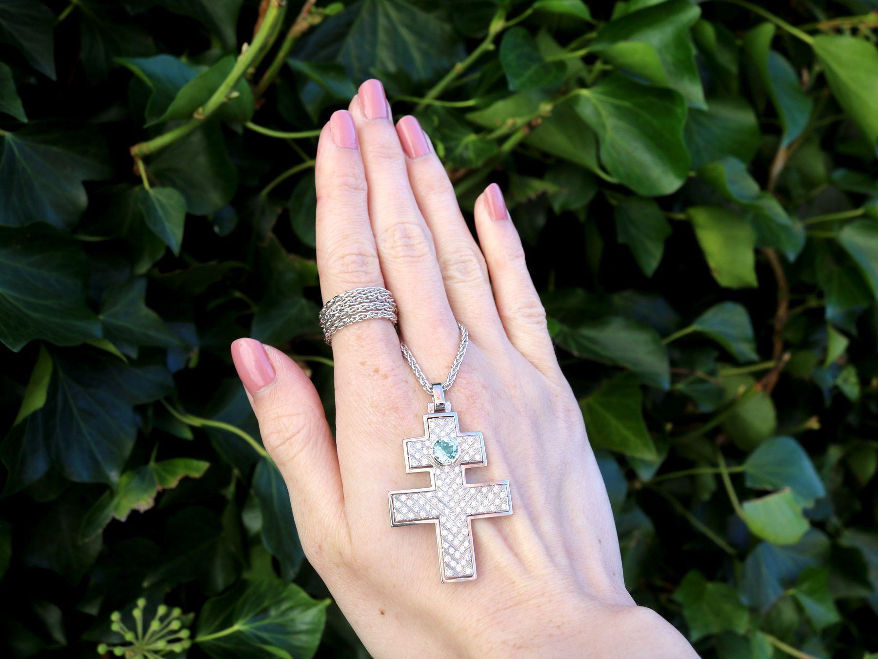 A stunning, fine and impressive 1.55 carat diamond and 0.80 carat aquamarine, 18 karat white gold cross pendant; part of our diverse vintage jewelry and estate jewelry collections.

This impressive vintage pendant has been crafted in 18k white