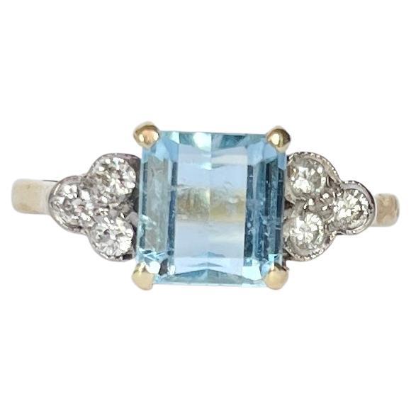 Bague solitaire vintage en or 18 carats avec aigue-marine et diamant en vente