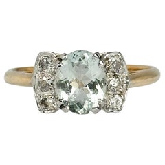 Anello solitario vintage con acquamarina e diamante in oro 18 carati
