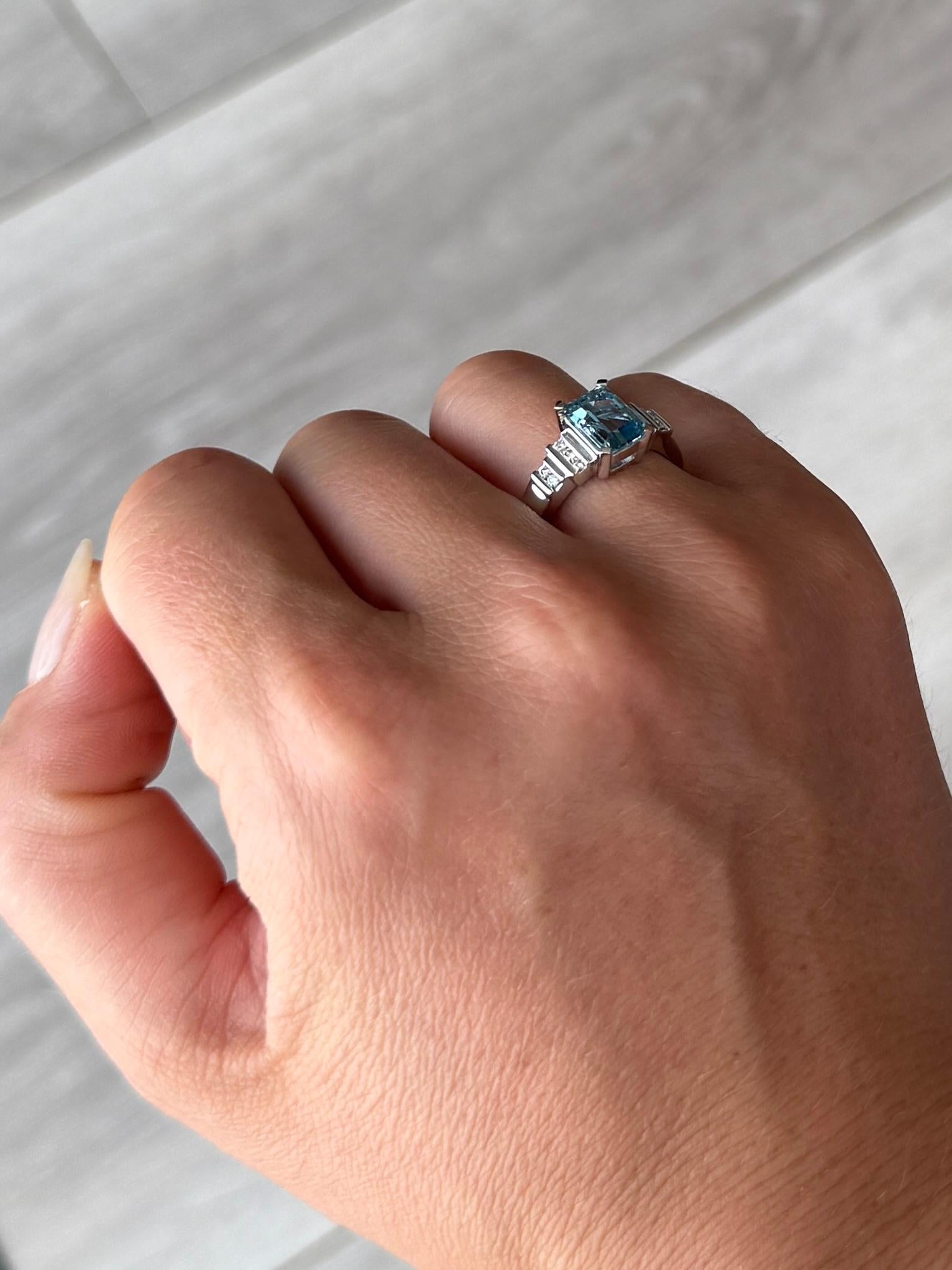 The gorgeous aquamarine stone in this ring is bright and has diamonds set either side. The aqua measures approx 1.5carat and the diamonds total 20pts. The ring is modelled in 18 carat white gold. 

Ring Size: N 1/2 or 7 
Stone Dimensions: