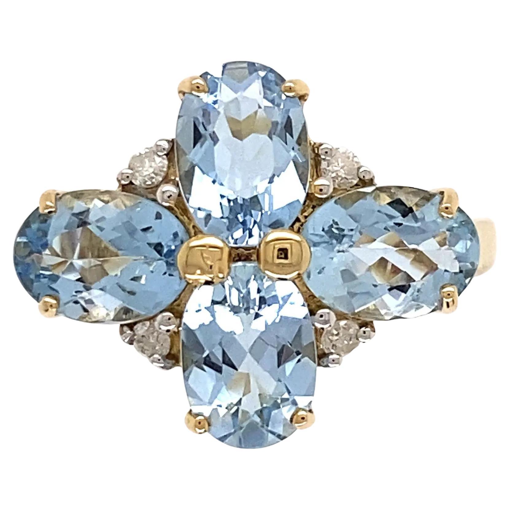 Bague vintage en or avec aigue-marine et diamant en vente