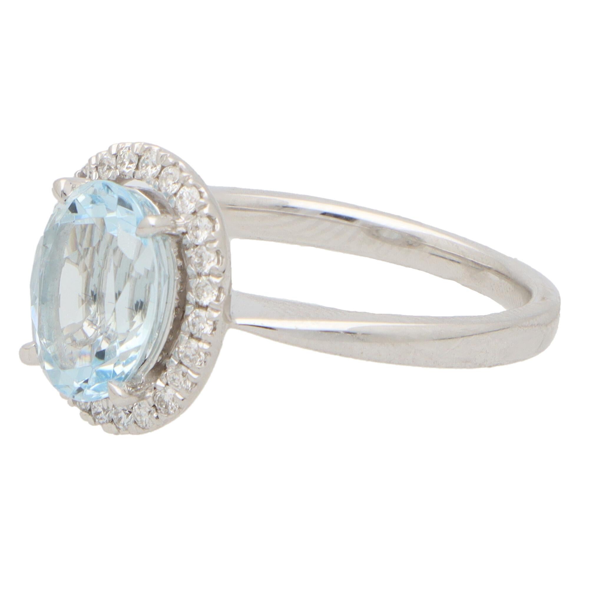 Oval Cut Vintage Aquamarine and Diamond Halo Cluster Ring in White Gold For Sale