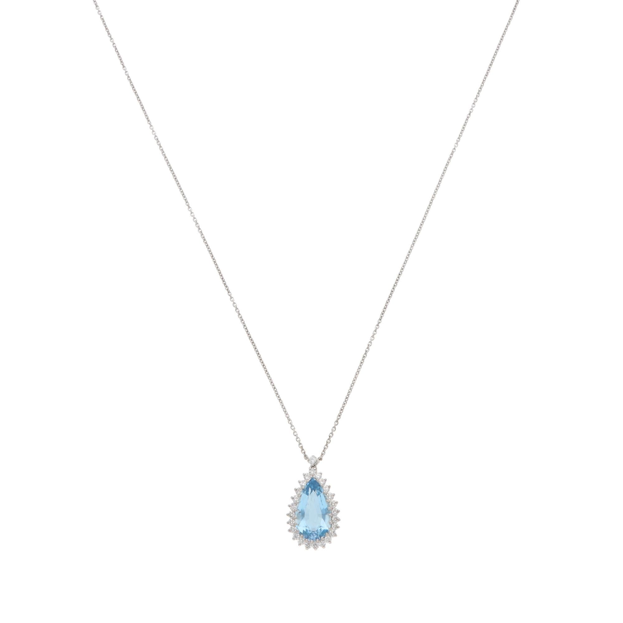 A beautiful vintage pear-shaped aquamarine and diamond cluster pendant necklace set in 18k white gold.

The pendant is predominately prong-set with a pear-shaped aquamarine, surrounded by 25 round brilliant-cut diamonds. The diamonds are set in