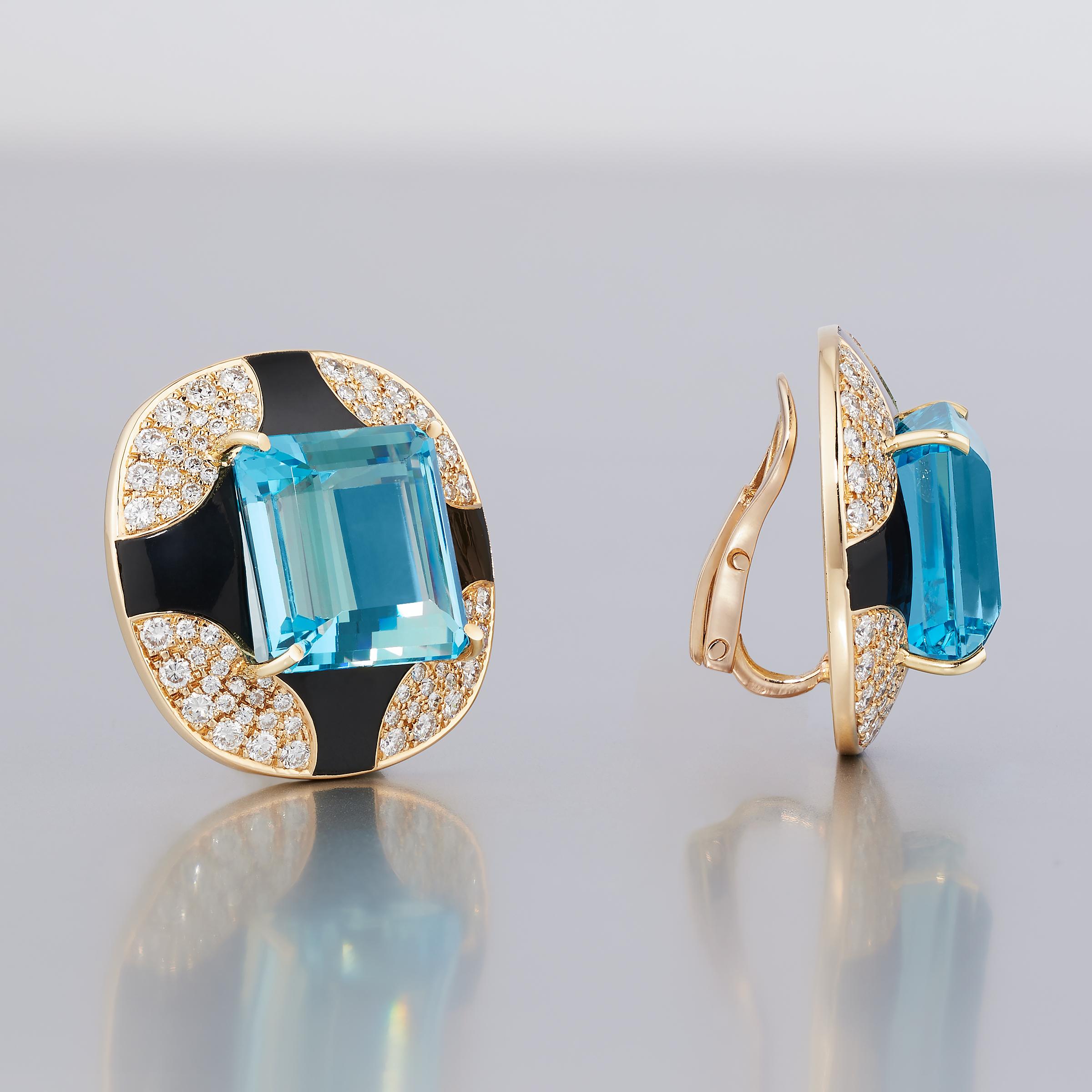 Exceptional one-of-a-kind large aquamarine diamond and black onyx earrings attributed to Mauboussin Paris and set in 18 karat yellow gold. These impressive earrings are a vintage creation dating to 1980s and are emblematic of the bold French