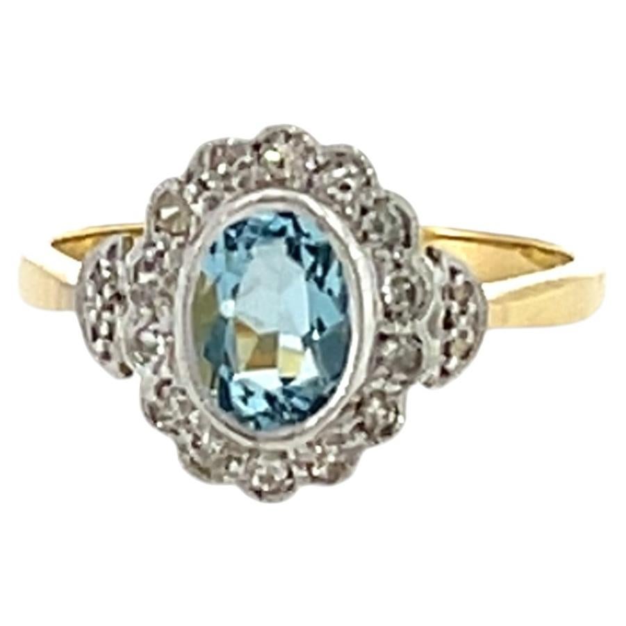 Anello vintage con diamanti a forma di aureola in oro giallo e bianco 18 ct.