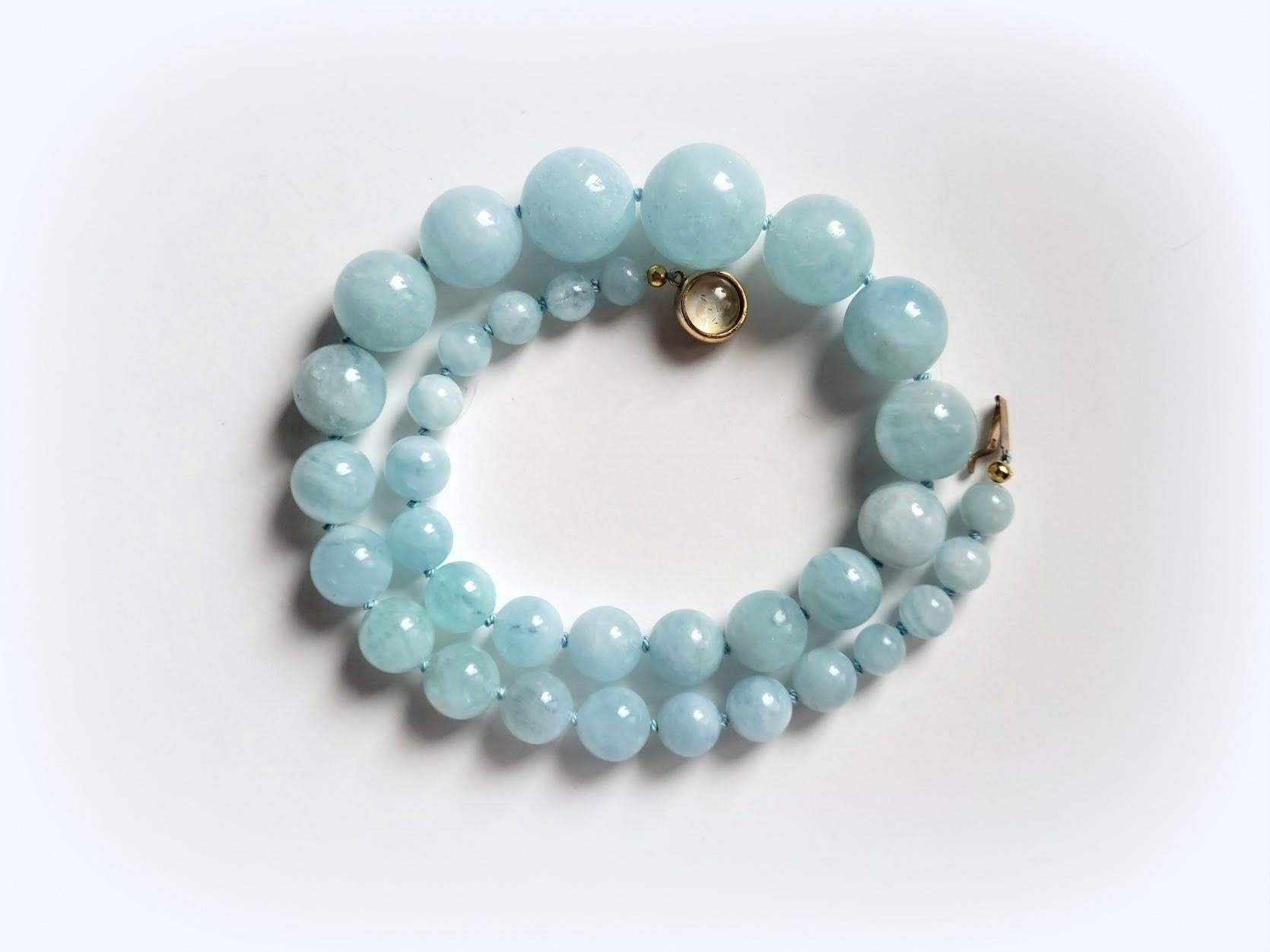The length of the necklace is 18.5 inches (47 cm). 
The size of the smooth round beads is from 8 mm to 19 mm. 
The color of the beads is a soft shade of blue sky. A very gentle soft pastel color! Beautiful statement beads of Blue Aquamarine!