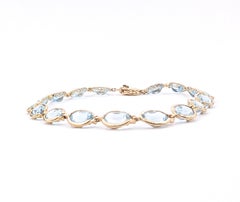 Pulsera tipo tenis vintage con aguamarinas en oro amarillo de 14 quilates