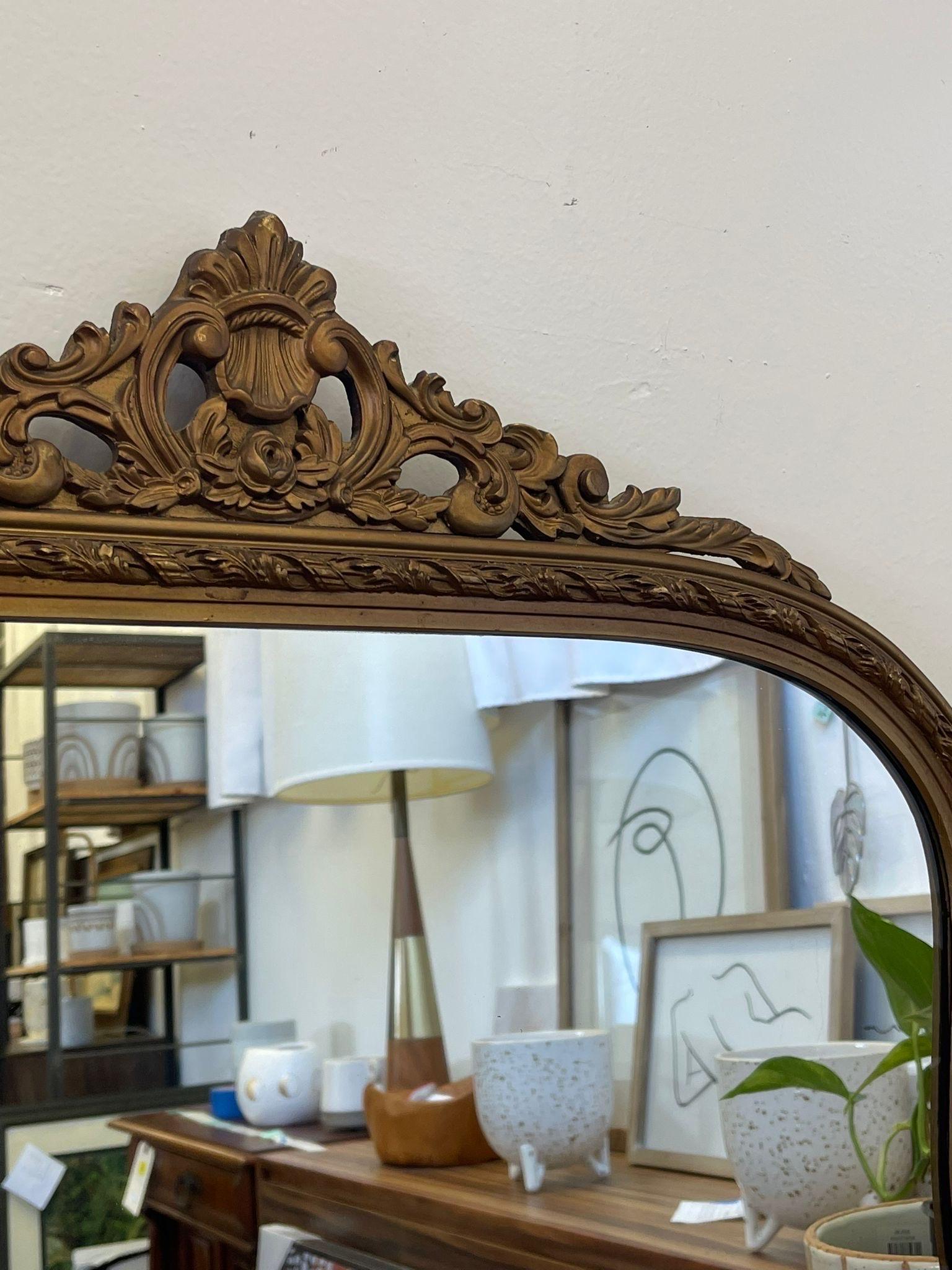 Mid-20th Century Vintage Arched Ornate Carved Gilt Wood Framed Mirror. Circa 1940s  For Sale