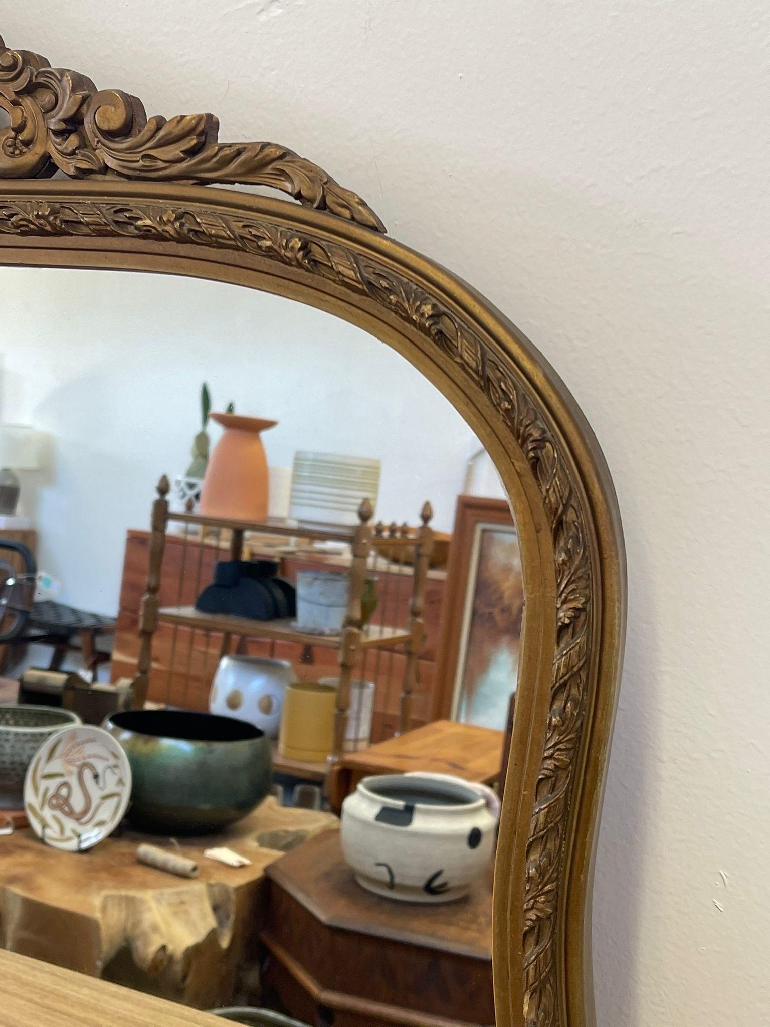Glass Vintage Arched Ornate Carved Gilt Wood Framed Mirror. Circa 1940s  For Sale