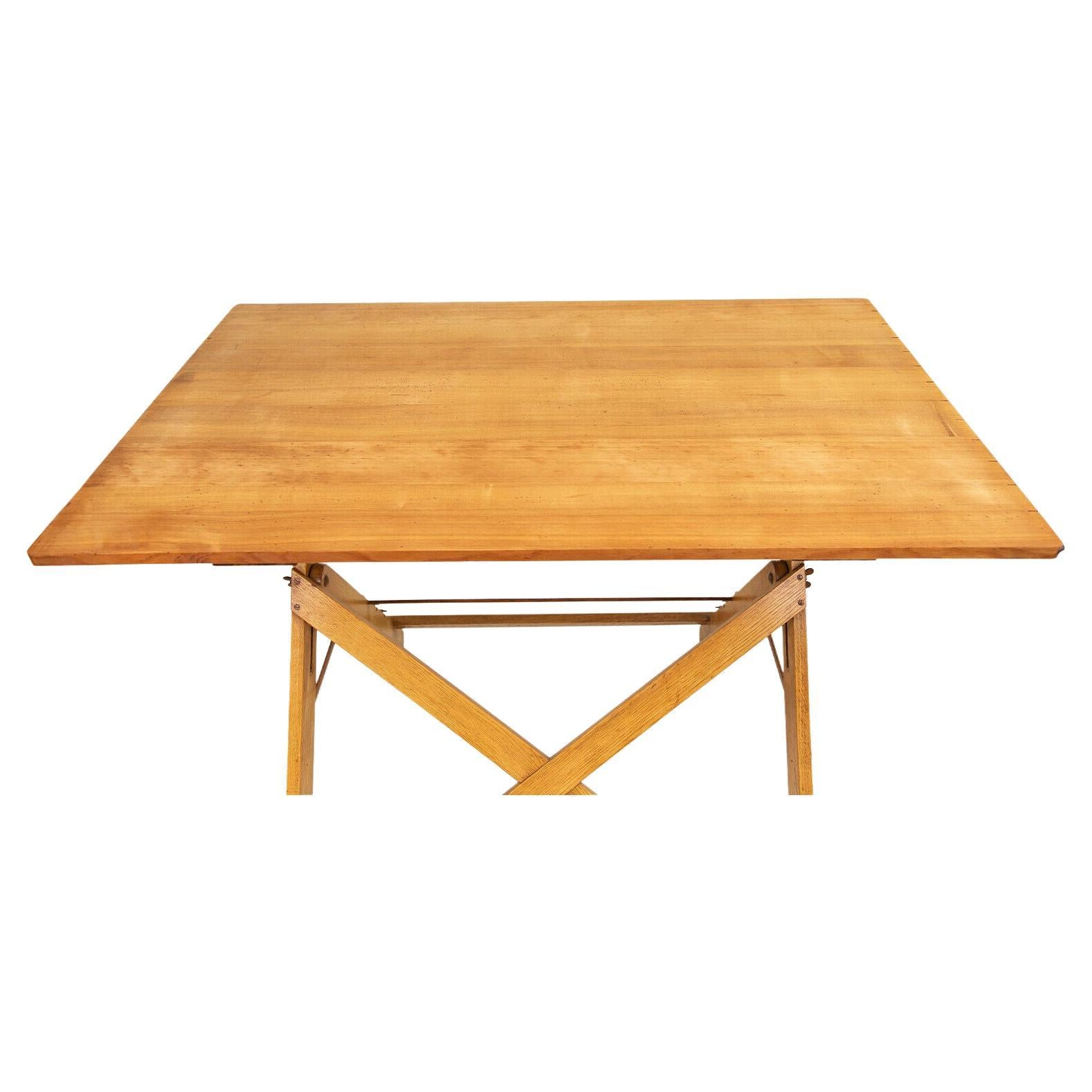 Mid-century architects table.

An excellent British Architects desk table from the mid-20th century.

This desk is fully adjustable and pivots and tilts in whichever direction you choose. 

Many functions can be used as an entertaining centre