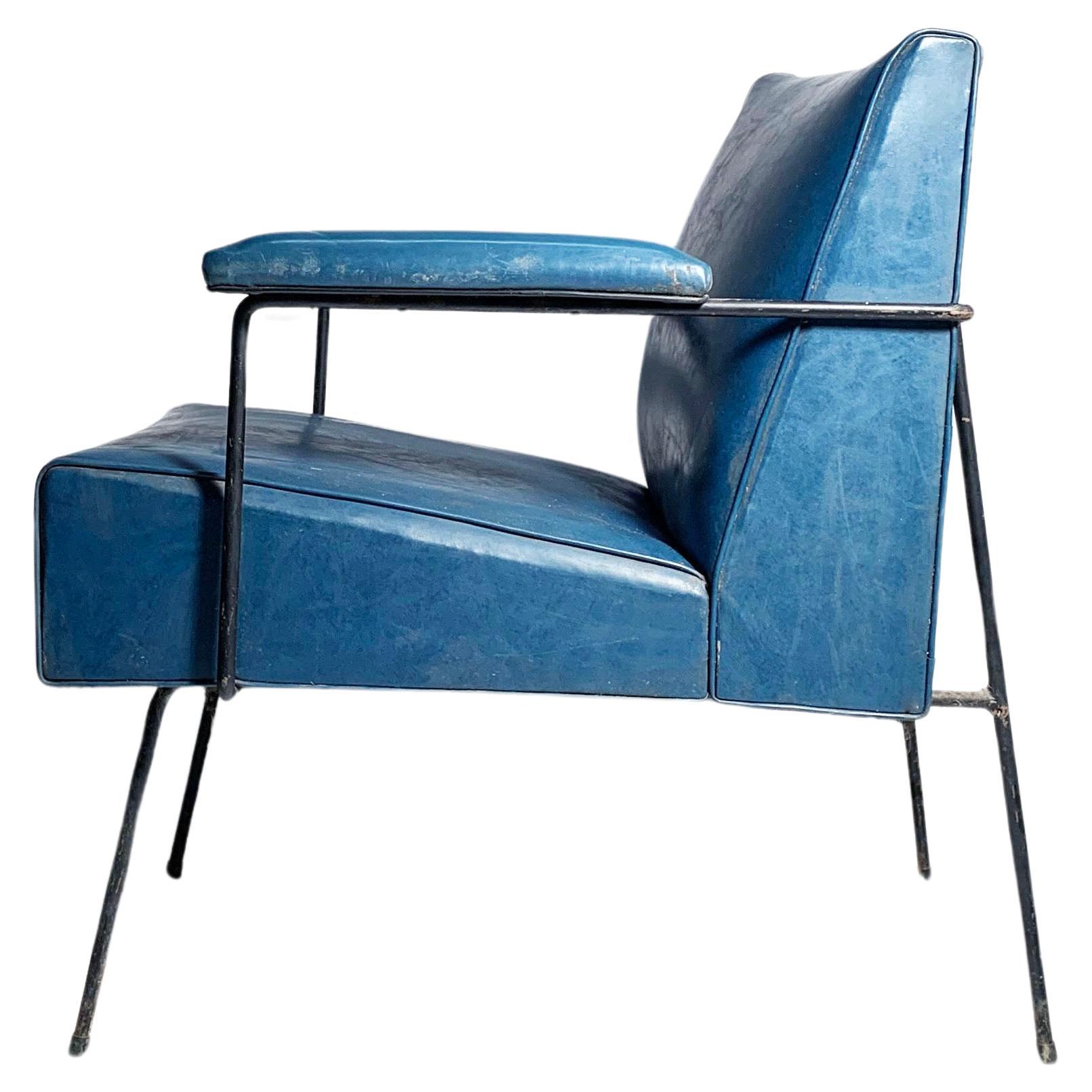 Sillón de diseño arquitectónico vintage con estructura de hierro
