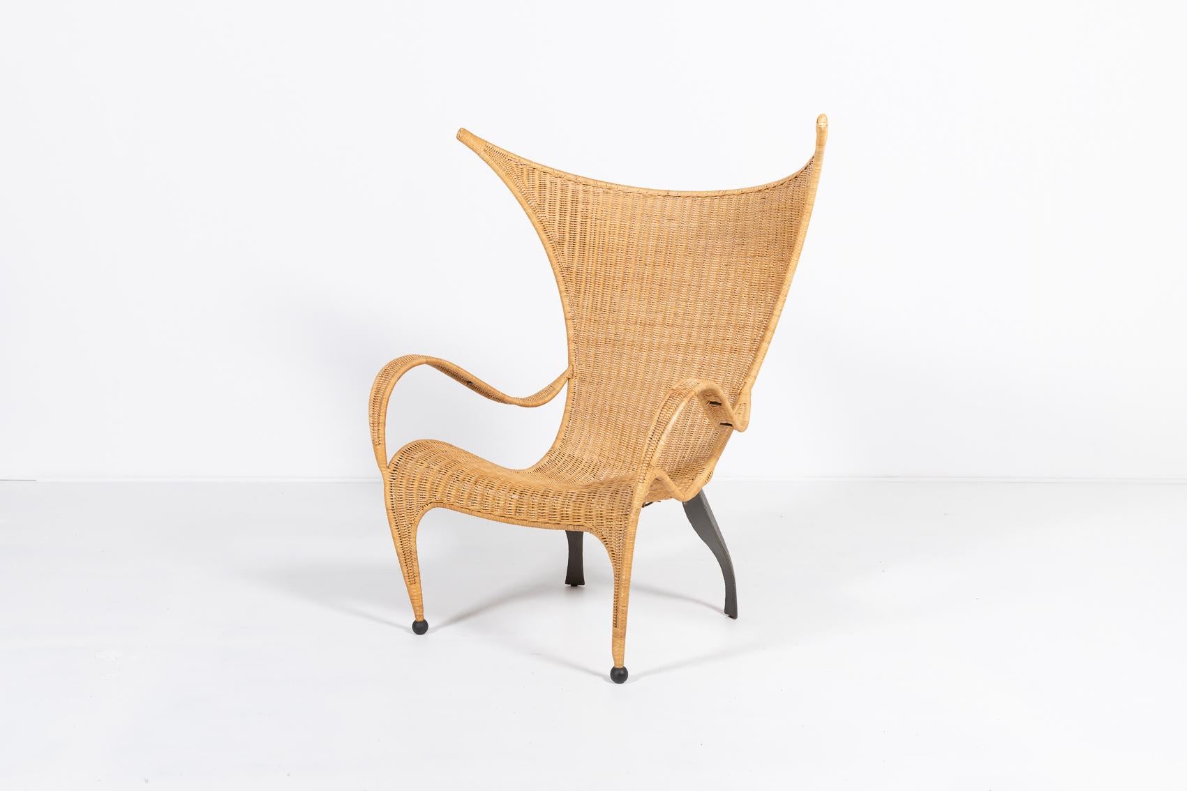 Sculptural Italian design armchair with casted steel frame and wicker seat. Spectacular shape chair which becomes an eye catcher in any interior.

Condition
Good, usage marks

Dimensions
width: 34,64 inch
height: 49,60 inch
depth: 27,56 inch
seat