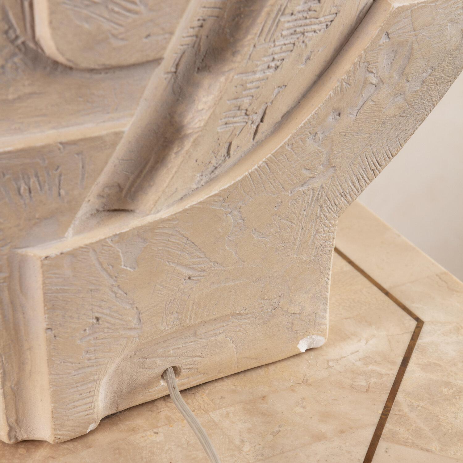 A vintage Brutalist postmodern plaster table lamp with an architecturally inspired relief rendered on both sides.