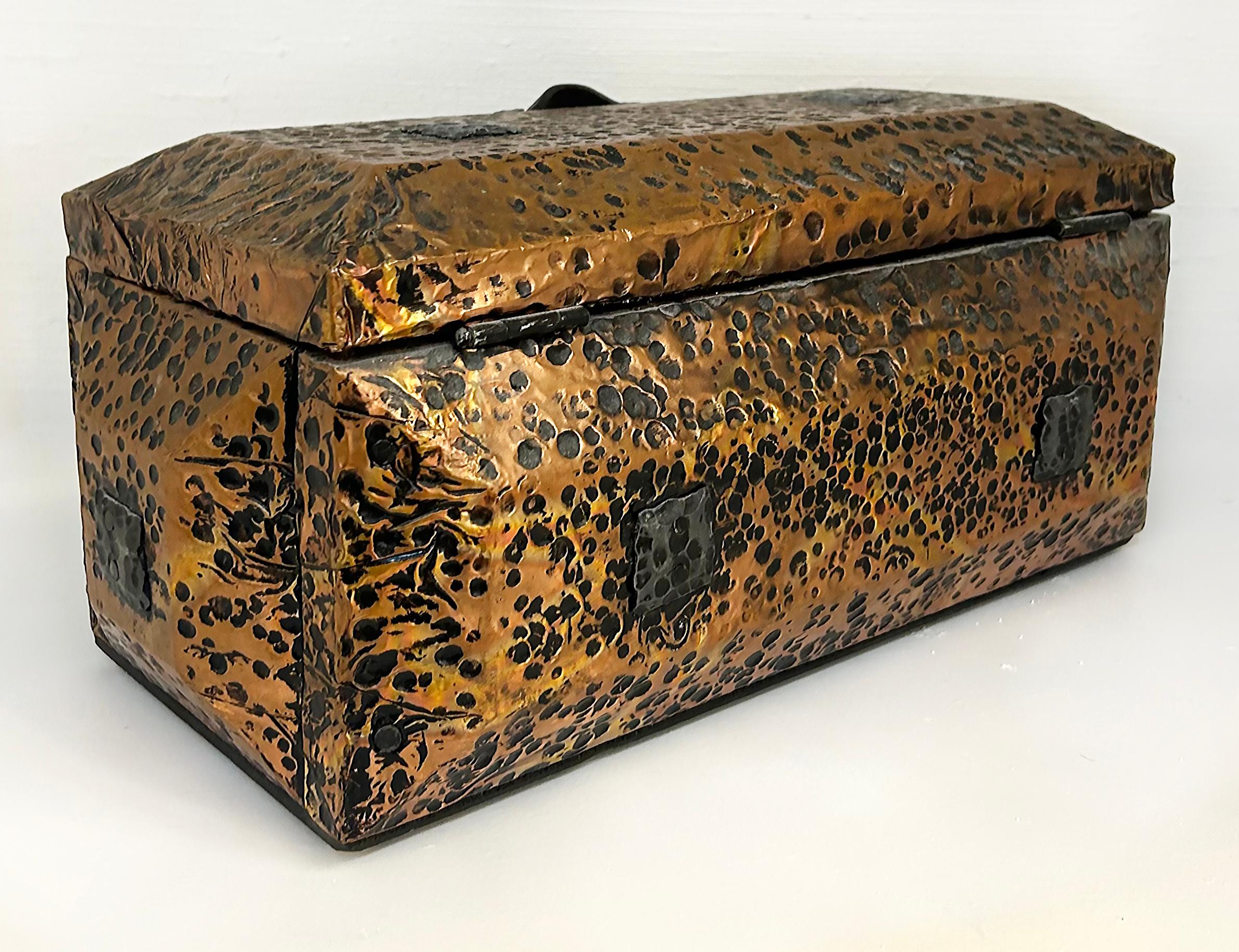 Vintage Arenson Studios “Infinity” Brutalist Hammered Box, Brass, Copper, Leather

Offered for sale is an Arenson Studios of West Palm Beach Brutalist hammered copper, brass, and leather coffered box.  This is a recent acquisition from a Key
