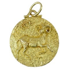 Pendentif Astrologique Aries vintage en or 18 carats