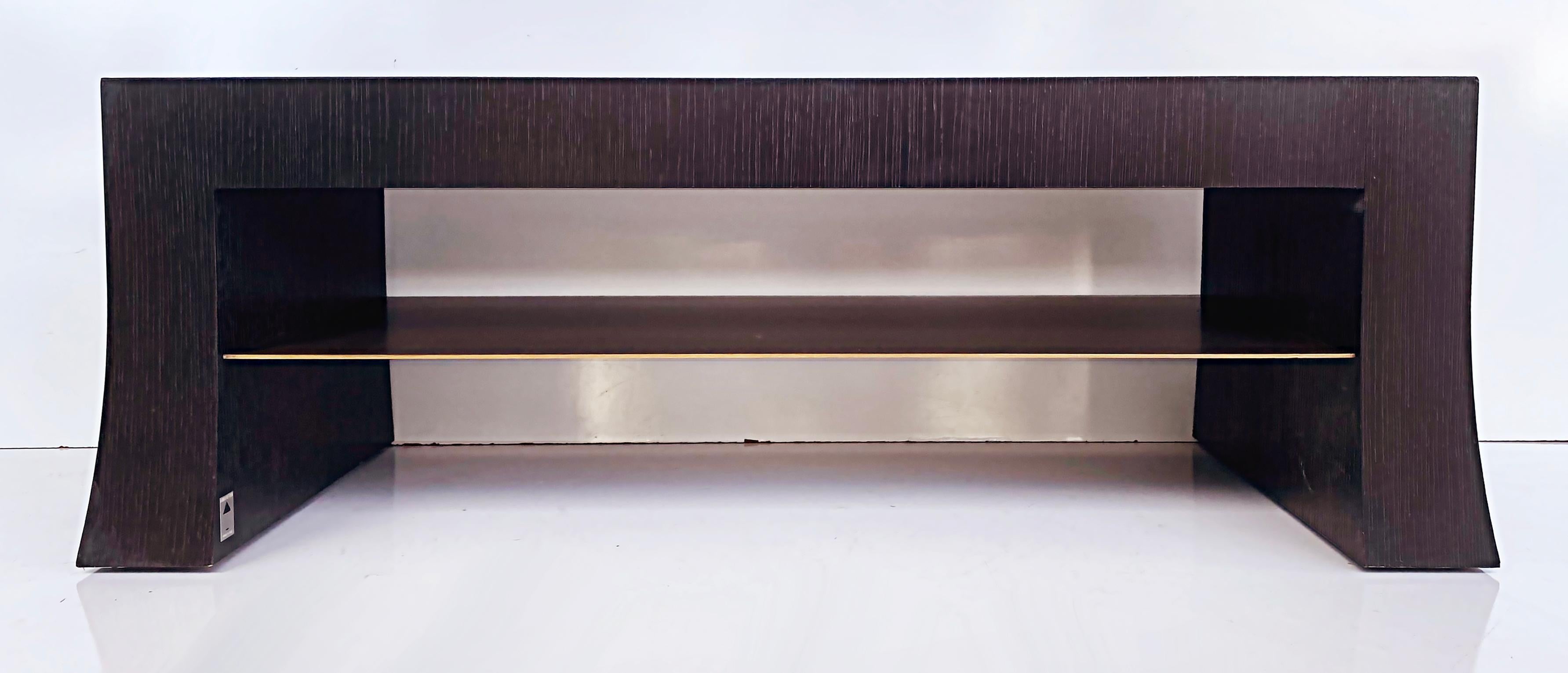 Vintage Armani Casa Italian Wenge Low Profile Night Stands

Offered for sale is a pair of Armani Casa Italian Wenge wood low profile night tables with drawer, signed and dating from 2015. This wonderful pair of night tables have wonderfully flared
