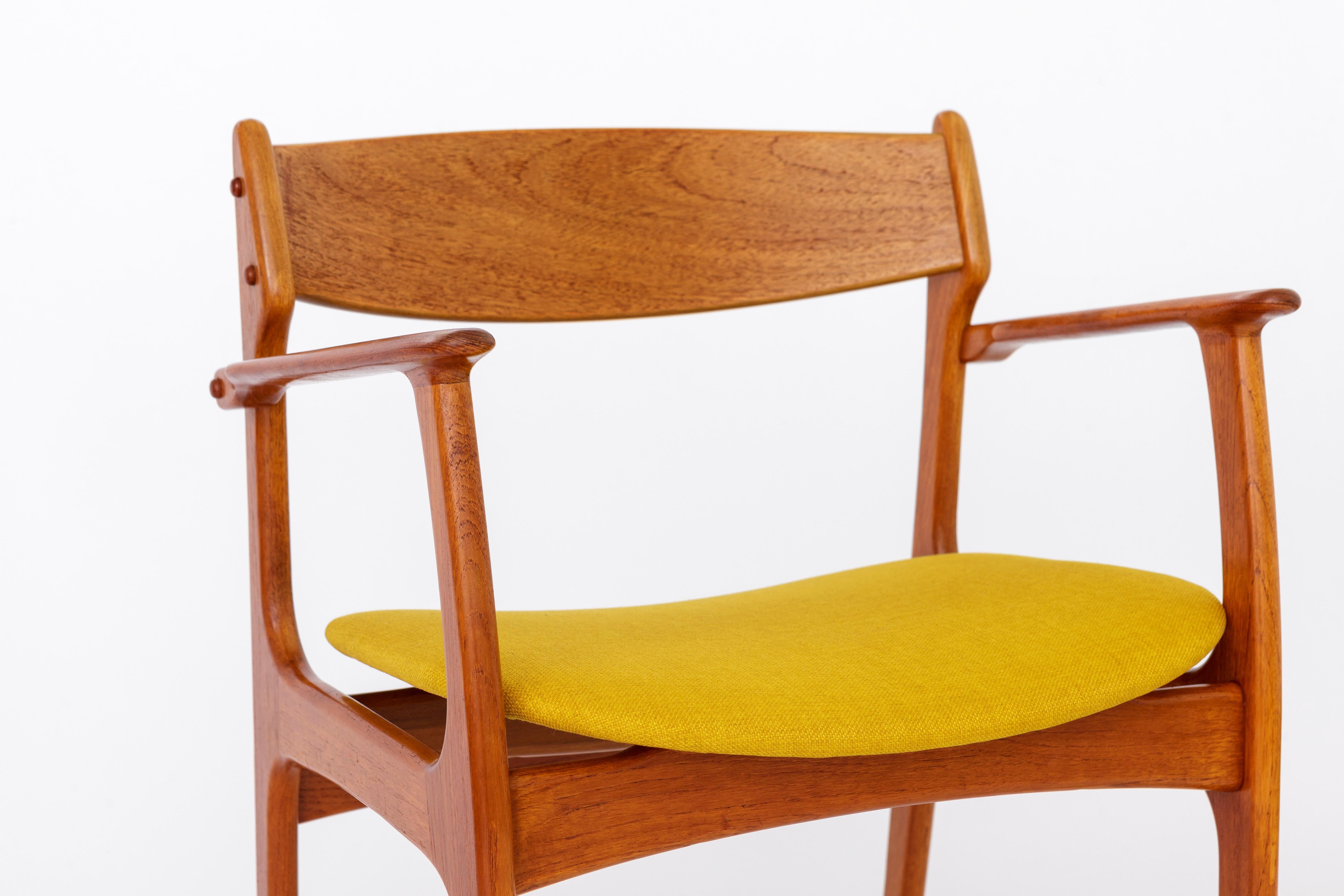 Armchair from the 1960s, designed by Erik Buch, Denmark. 

Sturdy teak wood chair frame. Refurbished and oiled. 
Reupholstered textile seat cover. 