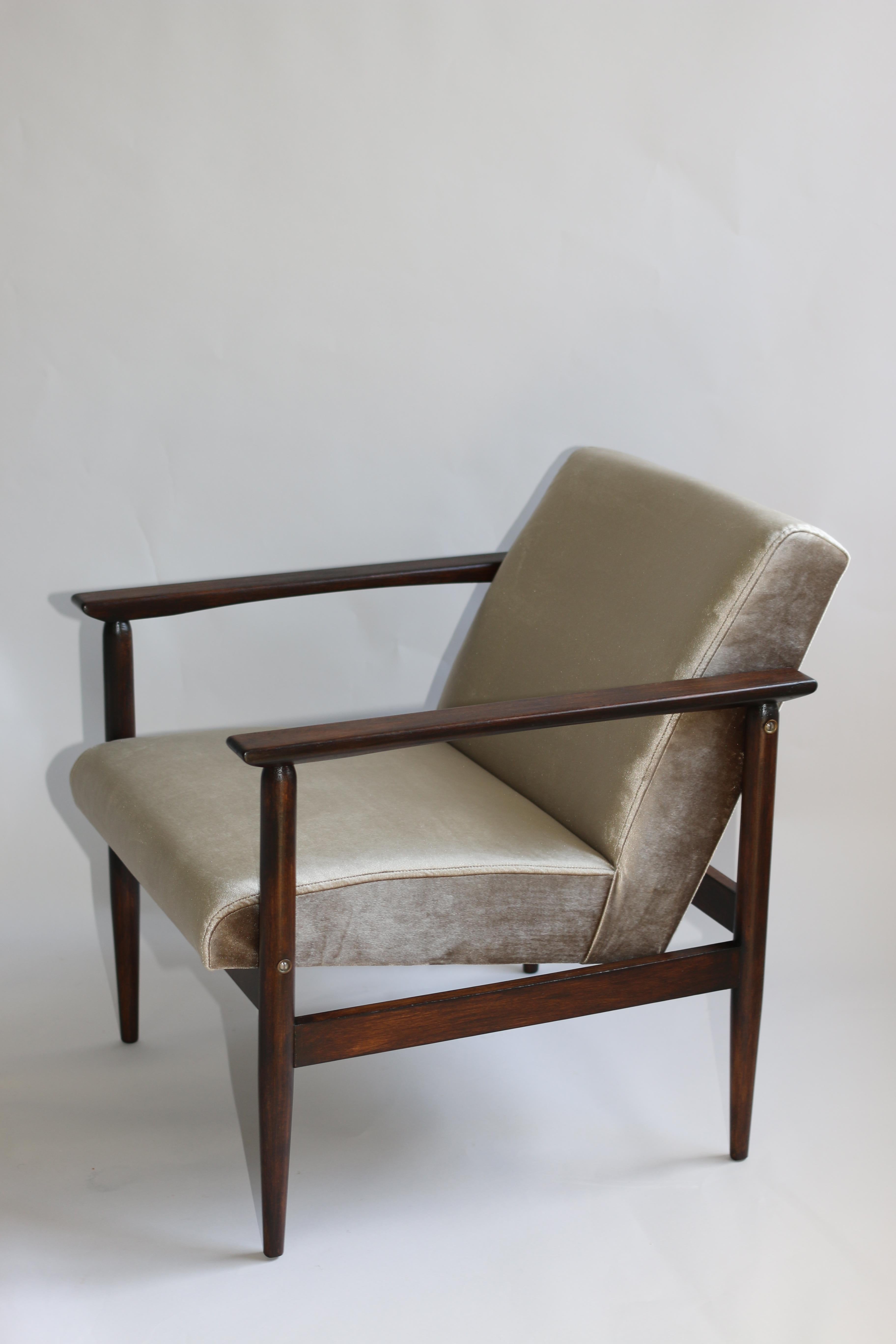 Vintage armchair design in beige made velvet from 1970s, new upholstery covered with velvet fabric in fashionable beige color, finished with wooden chair cushion. Wooden elements in dark oak color. Perfect condition. 

Dimension: H 68 x W 60 x D 63.