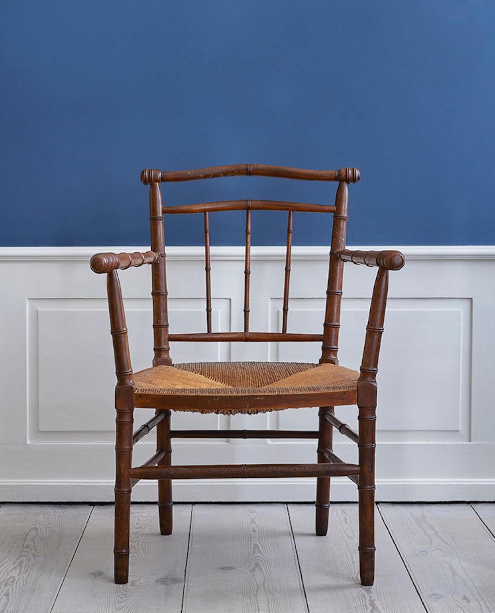 France, Early 20th century.

Armchair with faux bamboo details and wicker seat.

Measures: H 125 x W 60 x D 65 cm.