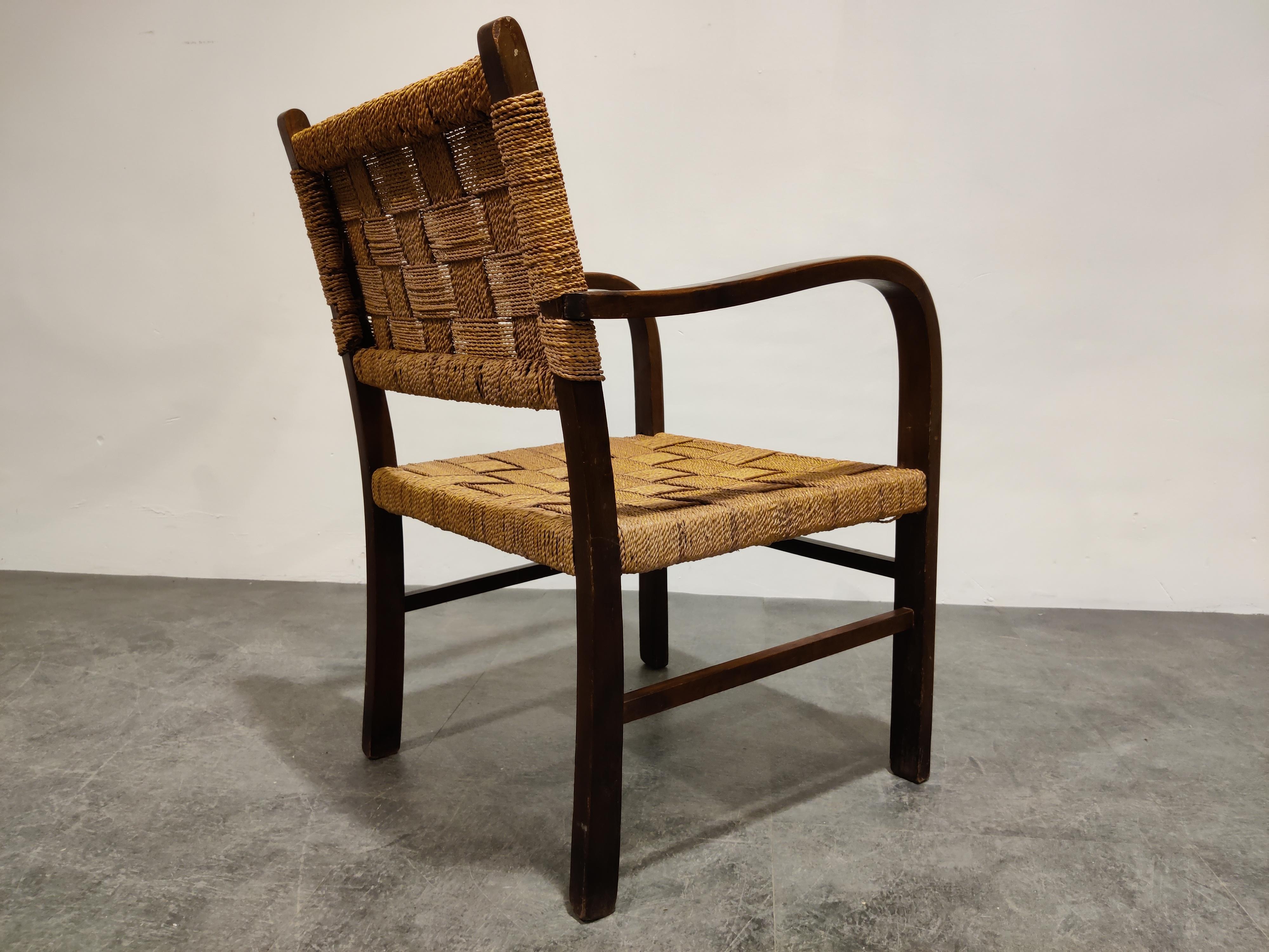 Charming midcentury - Art Deco style armchair made from braided cord.

Good original condition.

Beautiful design and the cord gives the piece an attractive colour

The chair is in good condition.

1950s - The