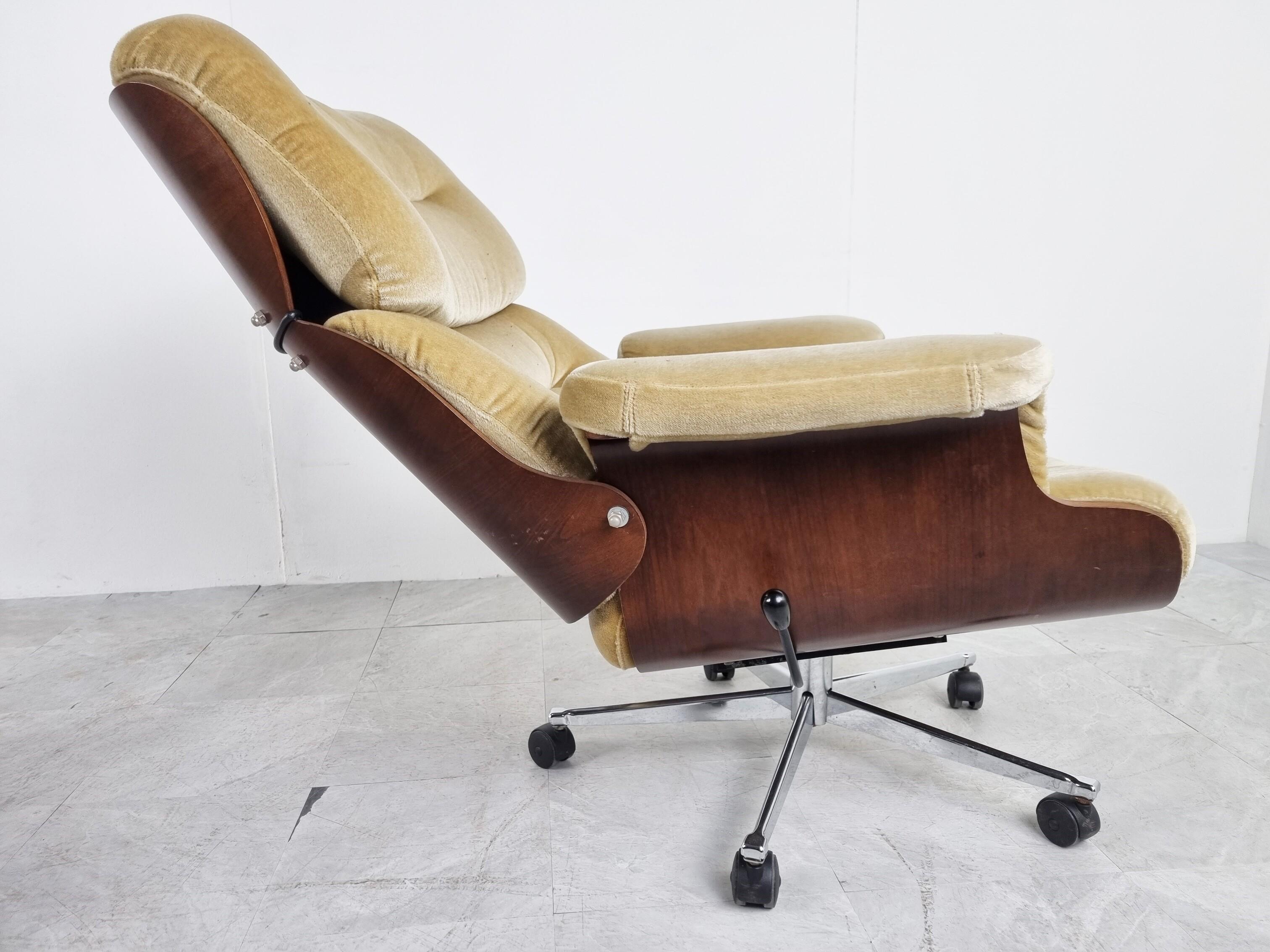 Mid century lounge chair with stool designed by Martin Stoll for Giroflex.

If you want the comfort and even the look of an eames chair with vintage vibes, this might be a great solution.

Nicely crafted plywood panels, chrome star shaped base